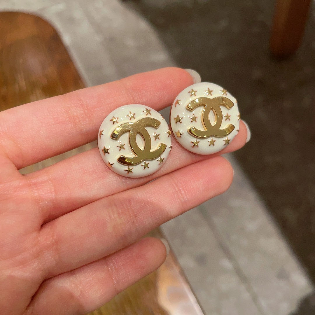 Double-C Emblem Stud Earrings in Polished Metal-Tone – Star Detail – Design 013 side detail
