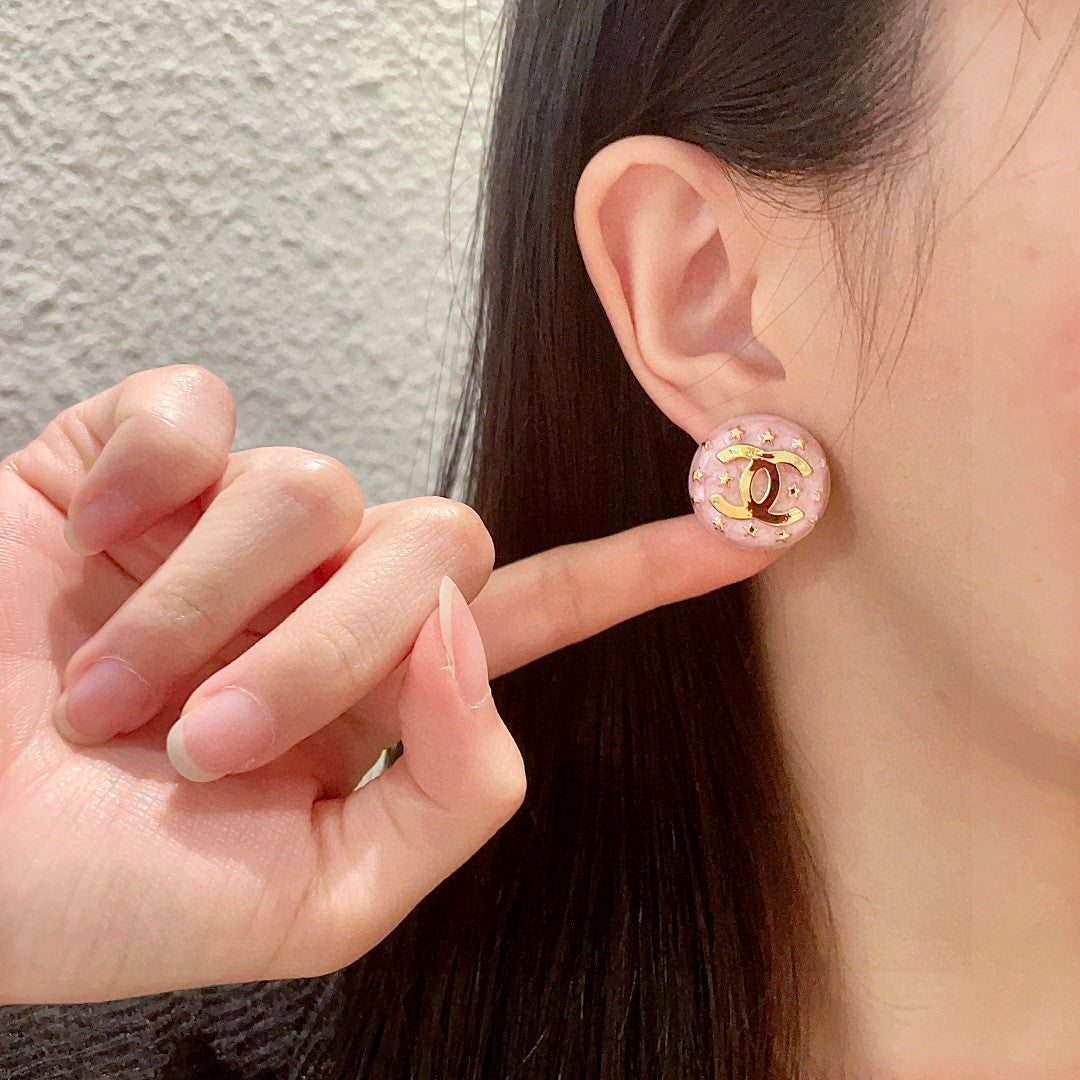 Double-C Emblem Stud Earrings in Polished Metal-Tone – Star Detail – Design 012 front product view