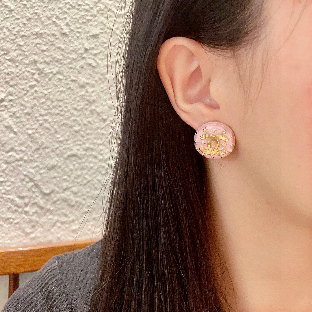 Double-C Emblem Stud Earrings in Polished Metal-Tone – Star Detail – Design 012 detail view