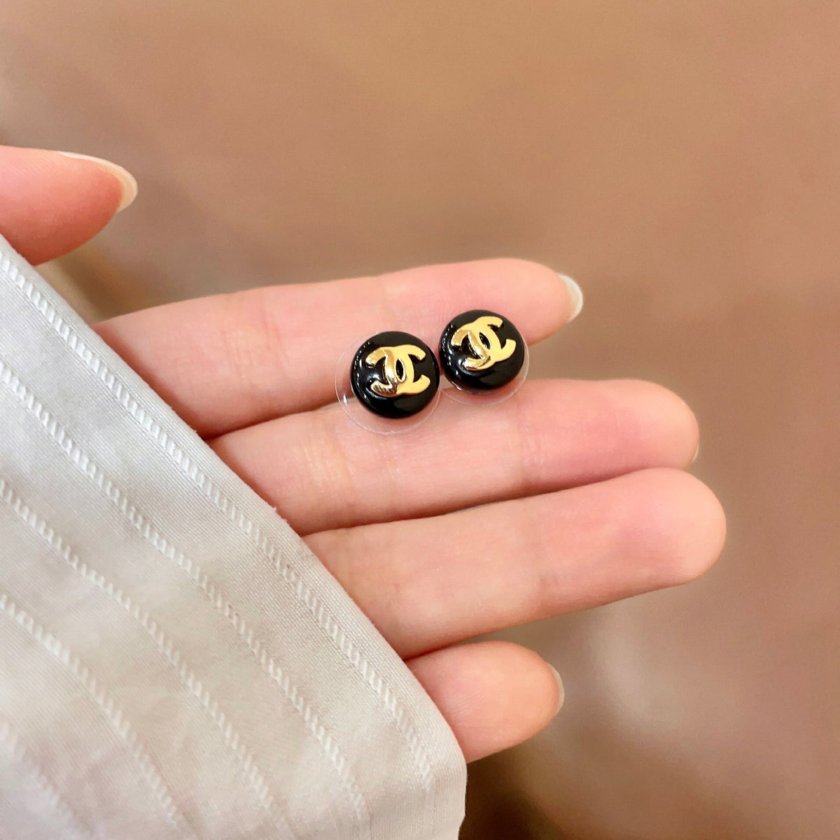 Signature Emblem Stud Earrings in Polished Metal-Tone – Design 050 side detail
