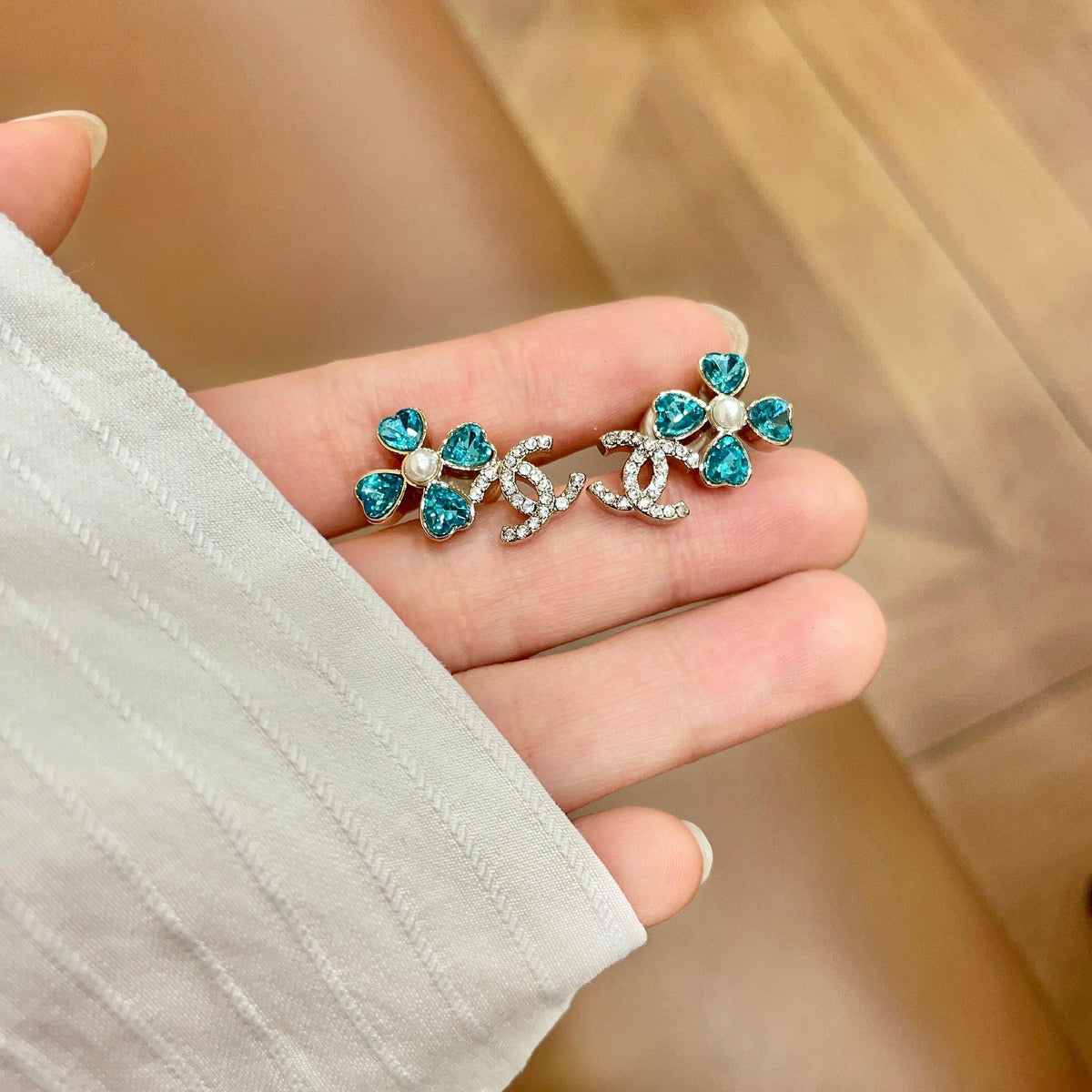 Signature Emblem Stud Earrings in Polished Metal-Tone – Design 045 side detail