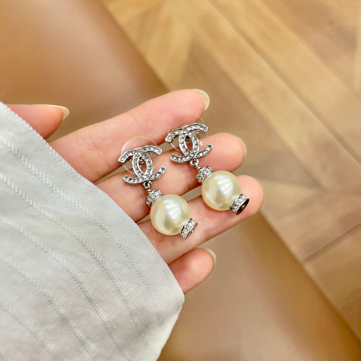 Signature Emblem Stud Earrings in Polished Metal-Tone – Design 039 side detail