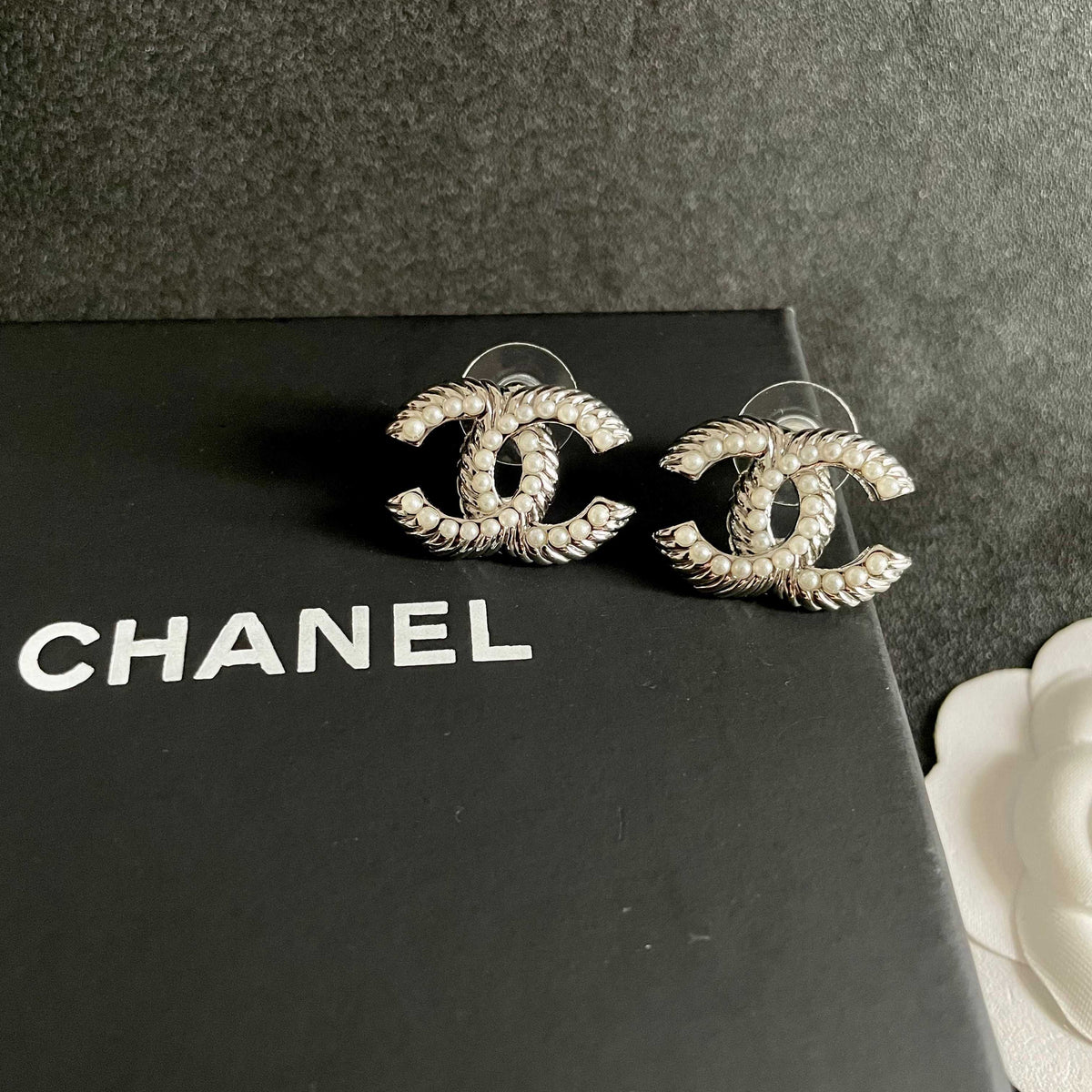 Signature Emblem Stud Earrings in Polished Metal-Tone – Design 034 detail view