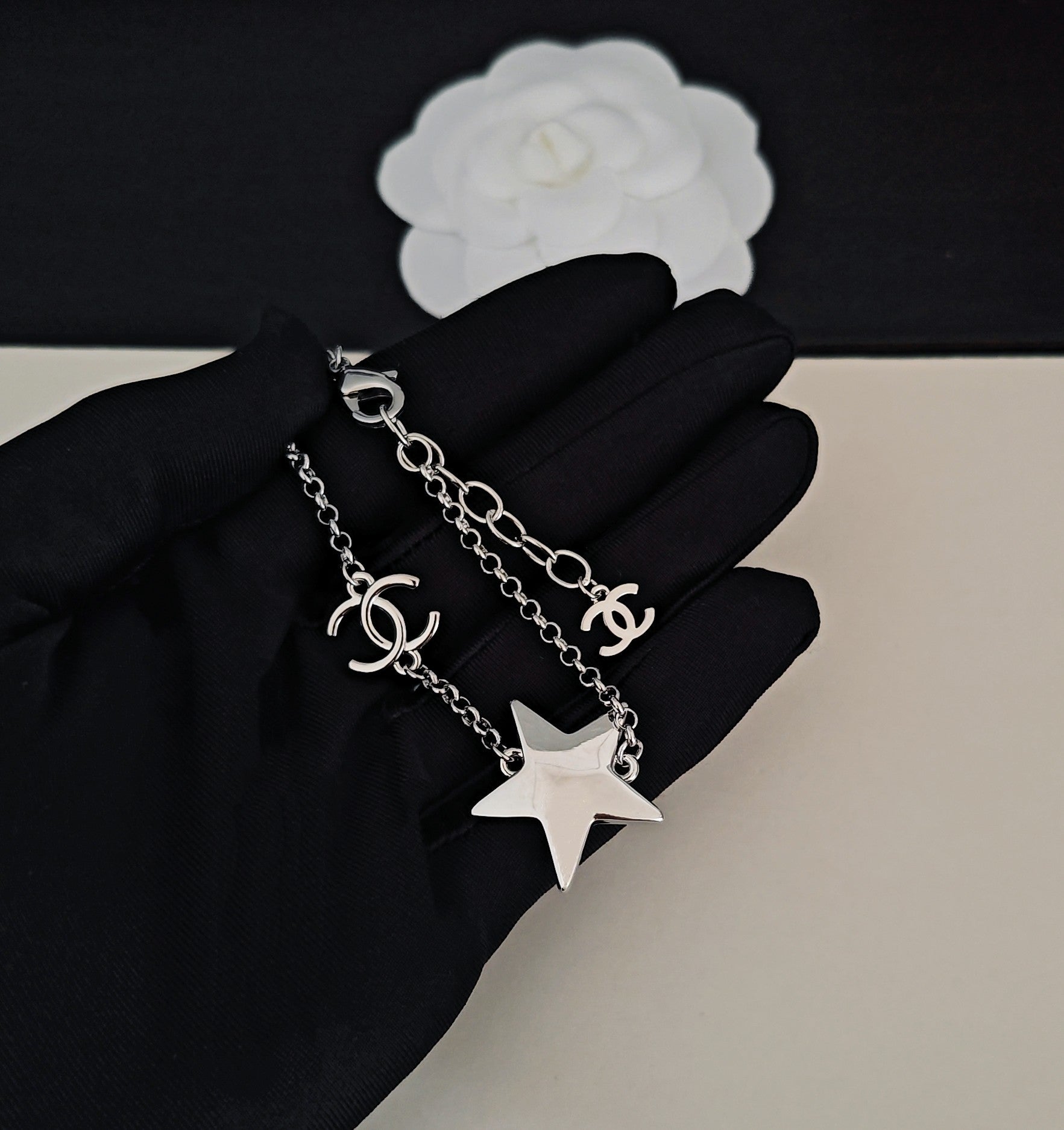 Signature Emblem Bracelet in Gold-Tone – White Detail main product view