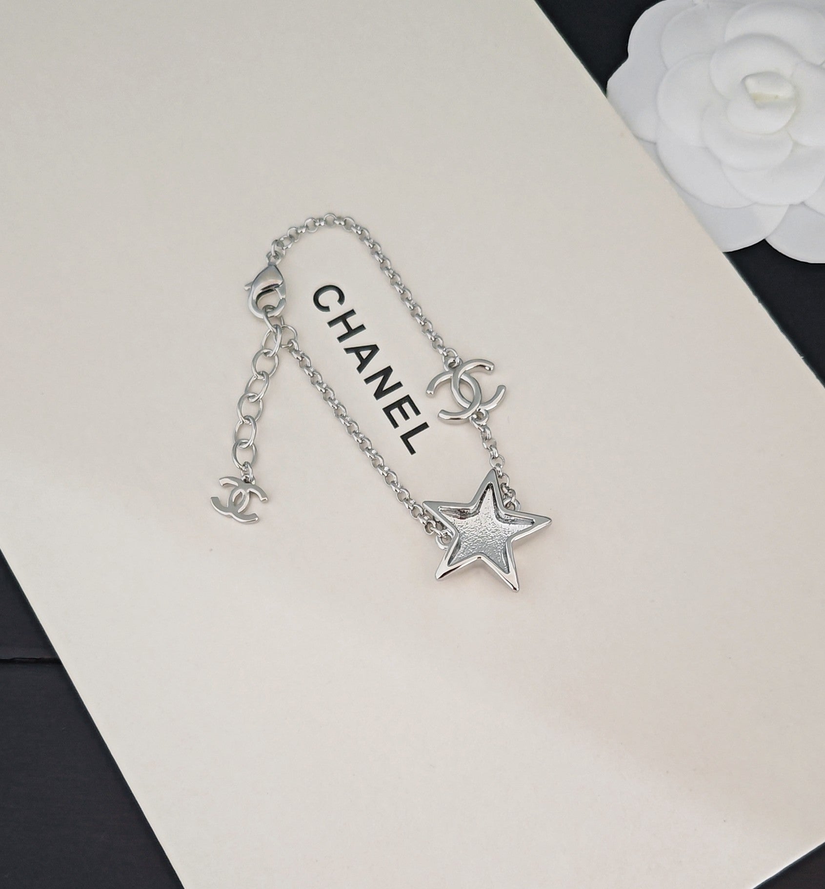 Signature Emblem Bracelet in Gold-Tone – White Detail front product view