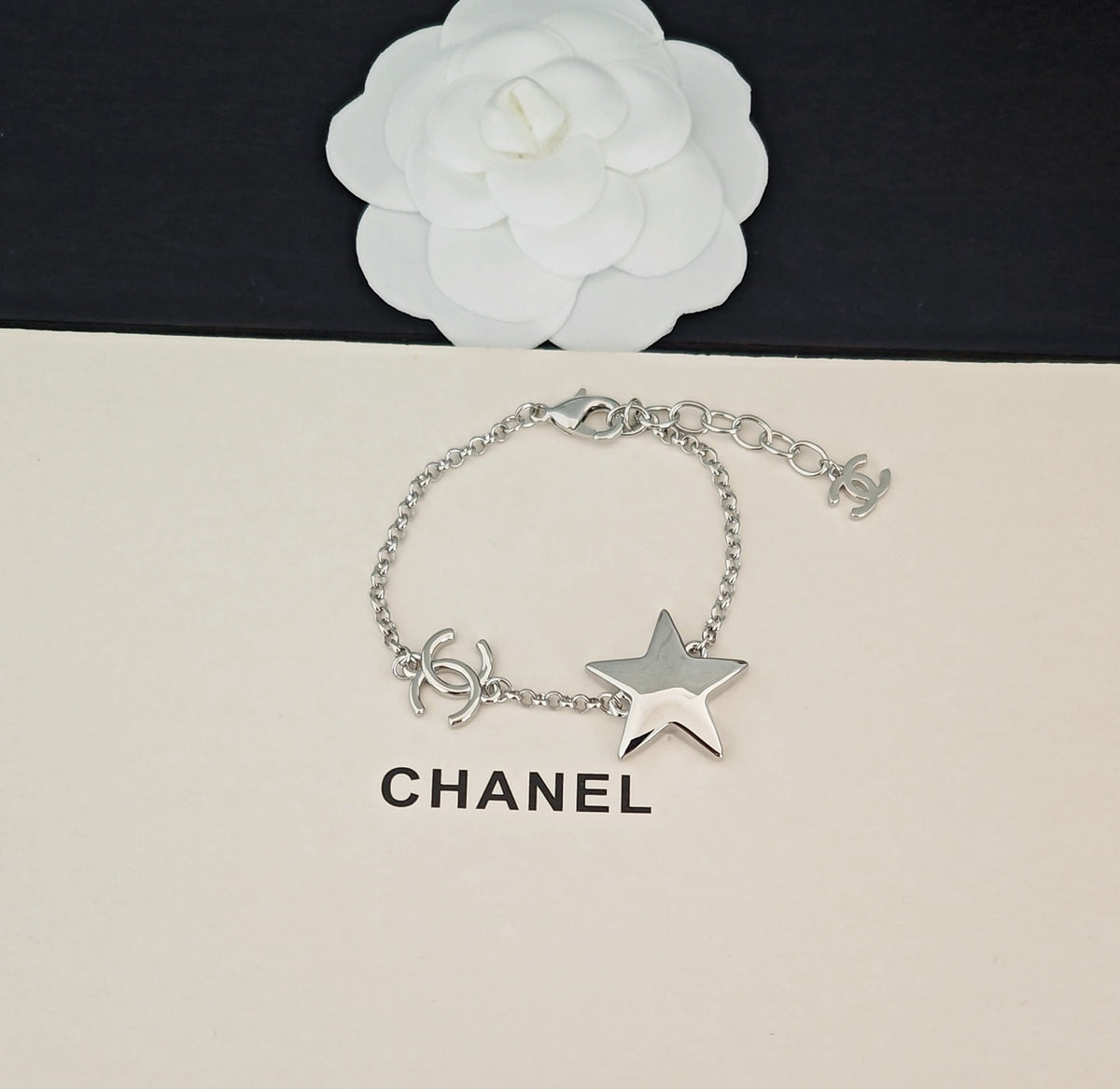 Signature Emblem Bracelet in Gold-Tone – White Detail detail view