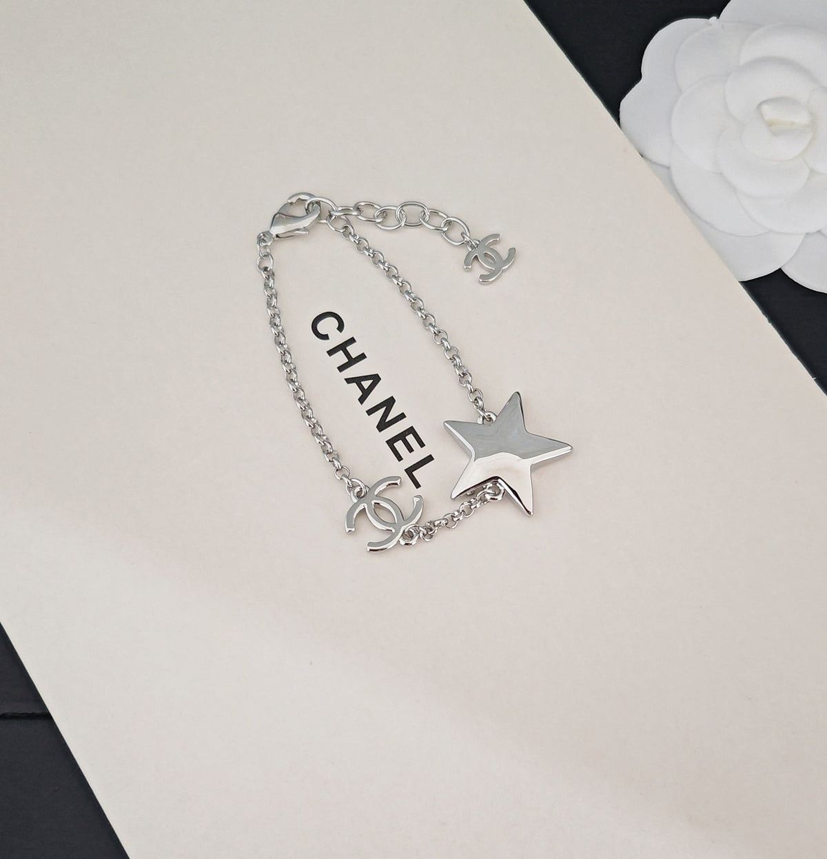 Signature Emblem Bracelet in Gold-Tone – White Detail side detail