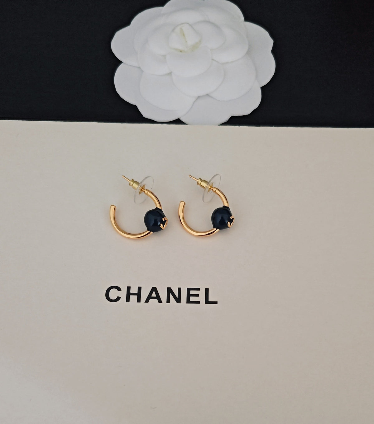 Signature Emblem Jewelry Accessory in Gold-Tone – Blue Detail side detail