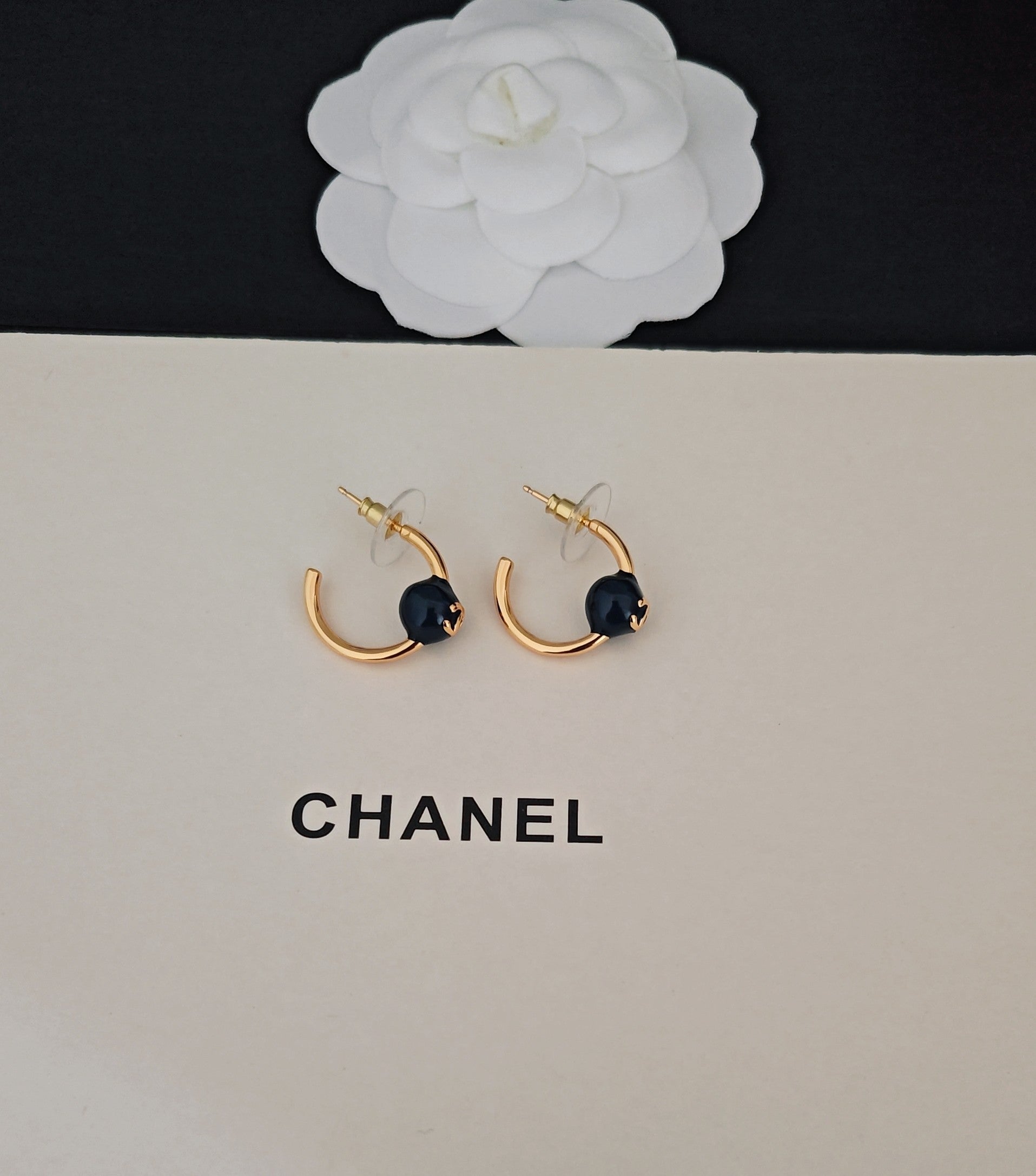 Signature Emblem Jewelry Accessory in Gold-Tone – Blue Detail side detail