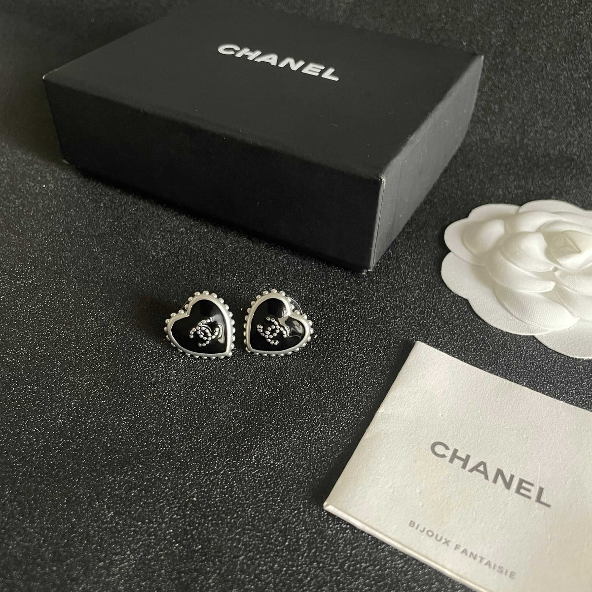 Double-C Emblem Stud Earrings in Polished Metal-Tone – Heart Detail – Design 012 close-up detail