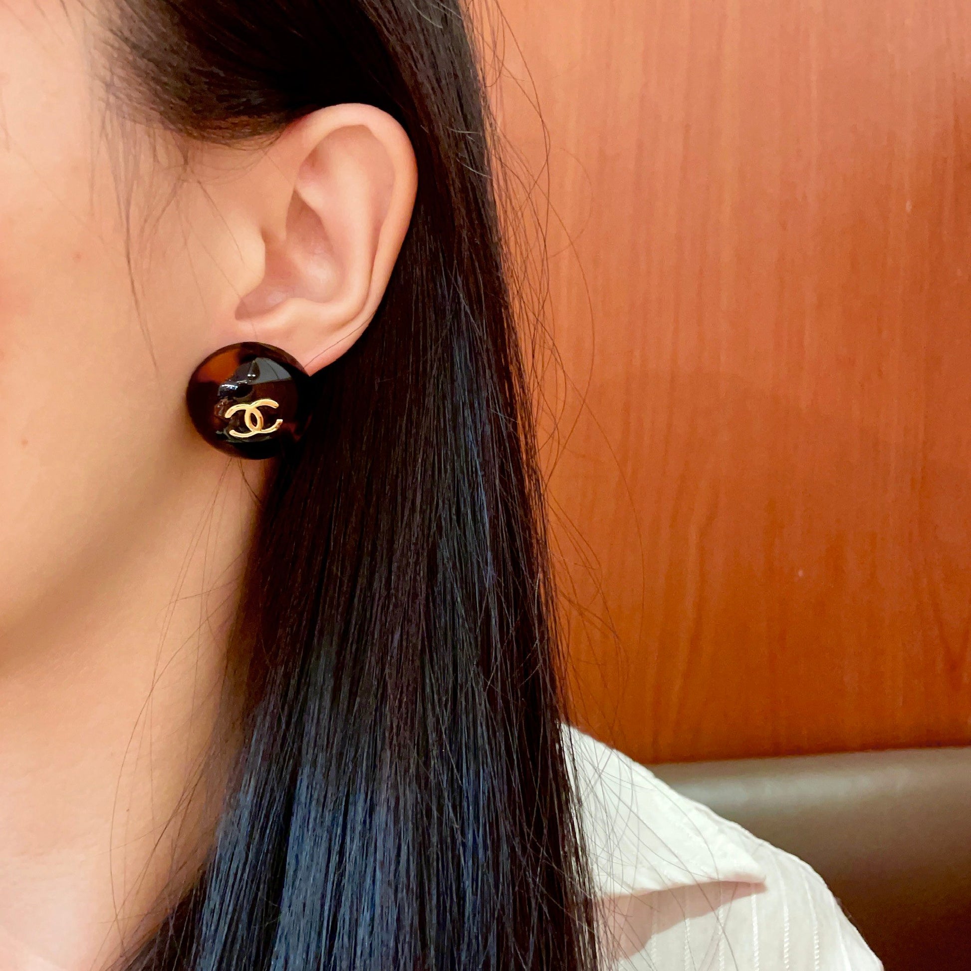 Double-C Emblem Stud Earrings in Polished Metal-Tone – Design 309 detail view