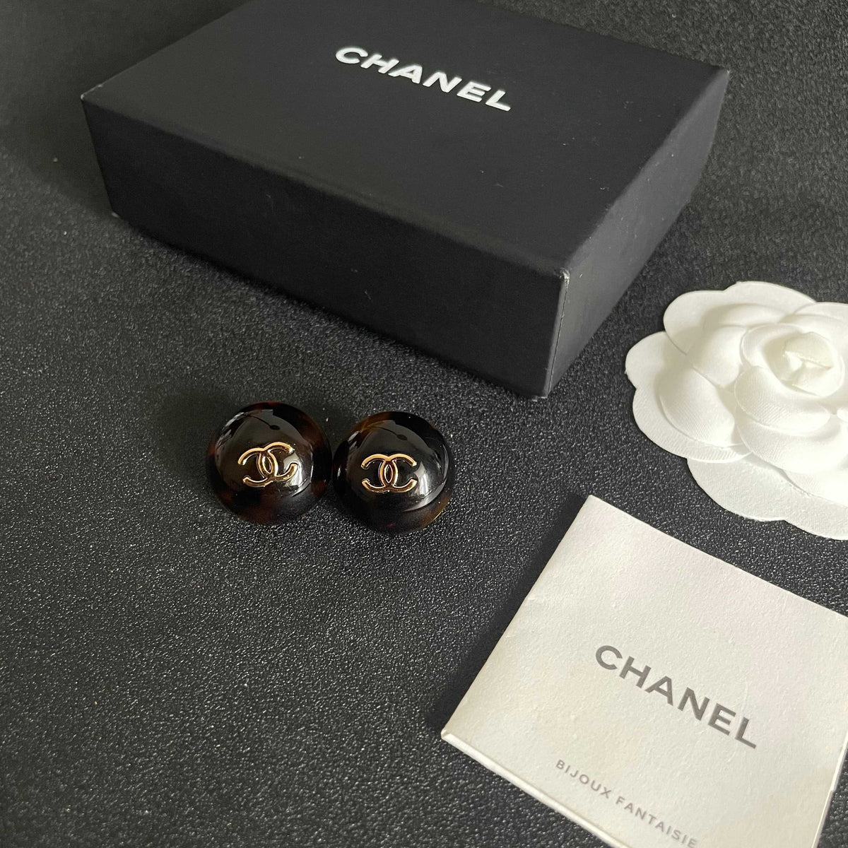 Double-C Emblem Stud Earrings in Polished Metal-Tone – Design 309 close-up detail