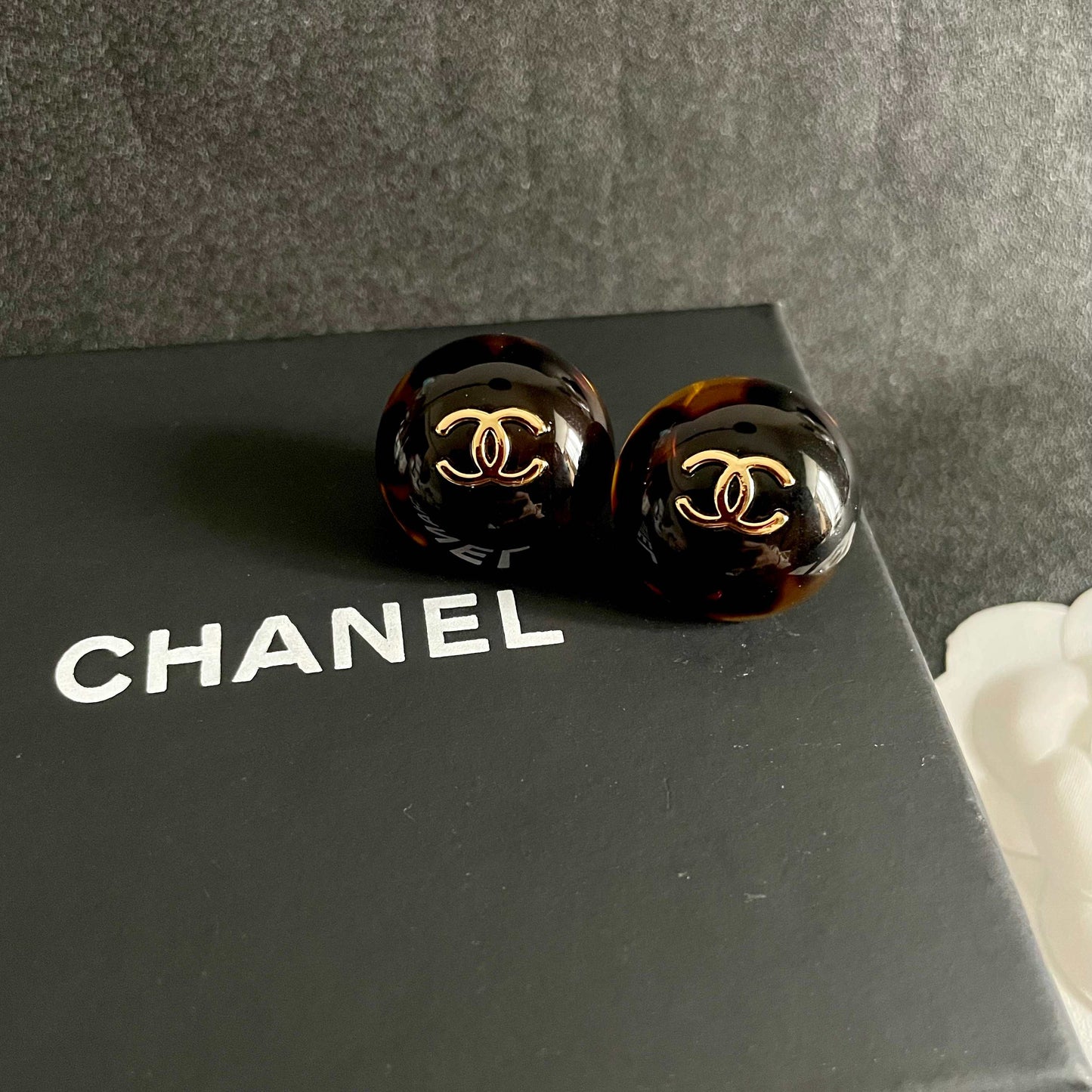 Double-C Emblem Stud Earrings in Polished Metal-Tone – Design 309 detail view