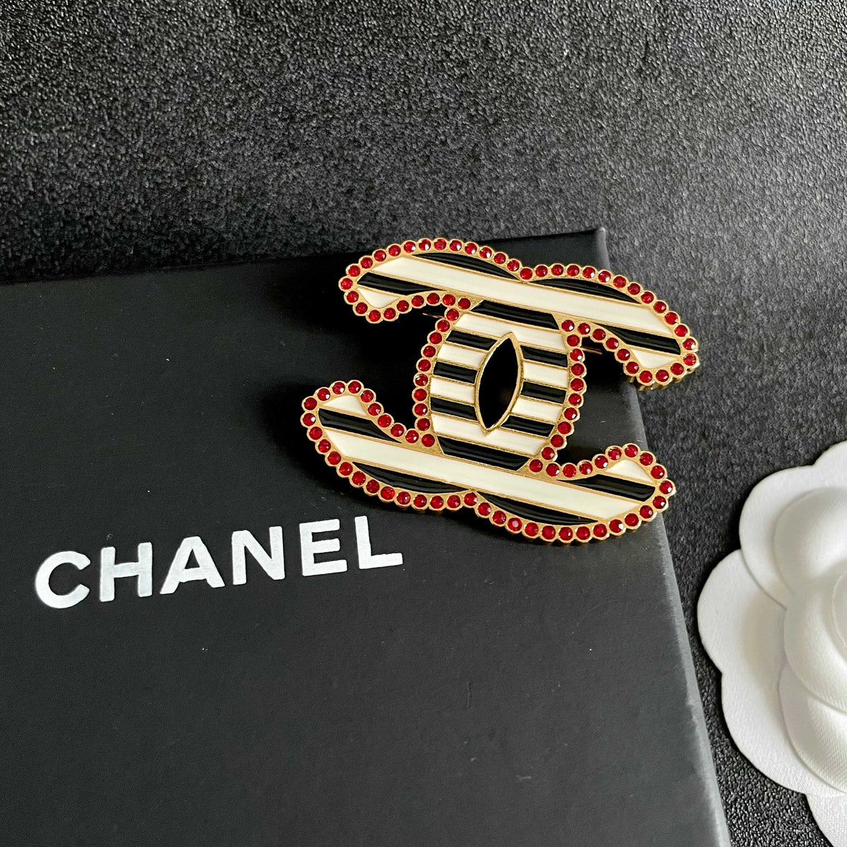 Double-C Emblem Brooch in Polished Metal-Tone – Design 045 detail view