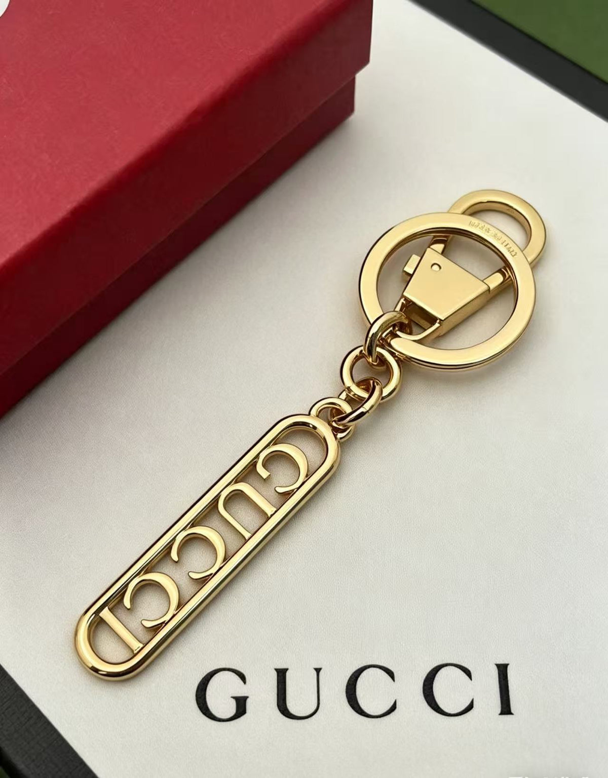 Letter Emblem Keychain in Polished Metal-Tone front product view