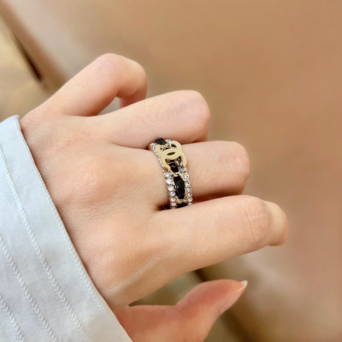 Double-C Emblem Statement Ring in Polished Metal-Tone – White Detail – Design 003 main product view