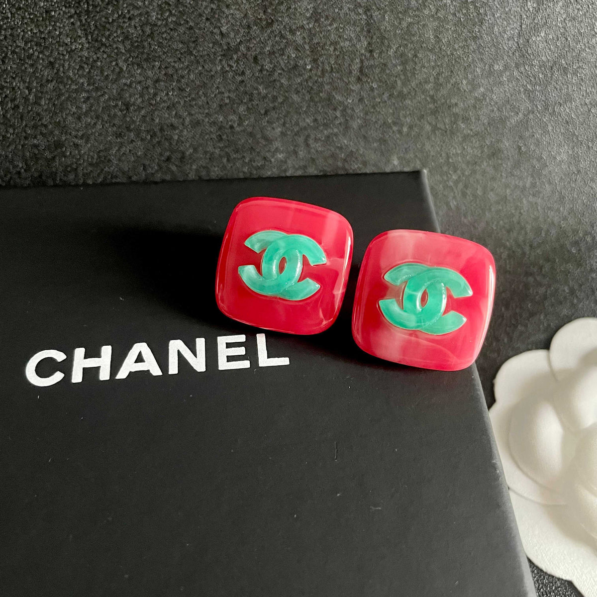 Double-C Emblem Stud Earrings in Polished Metal-Tone – Design 328 detail view