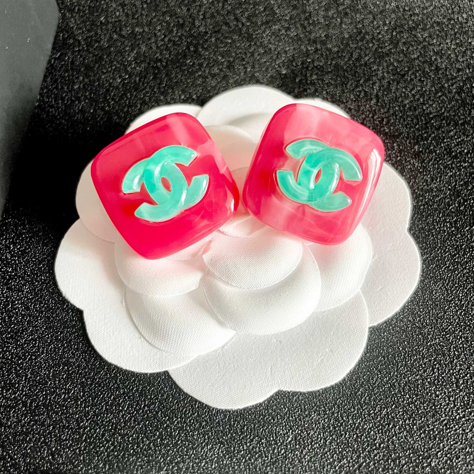 Double-C Emblem Stud Earrings in Polished Metal-Tone – Design 320 front product view