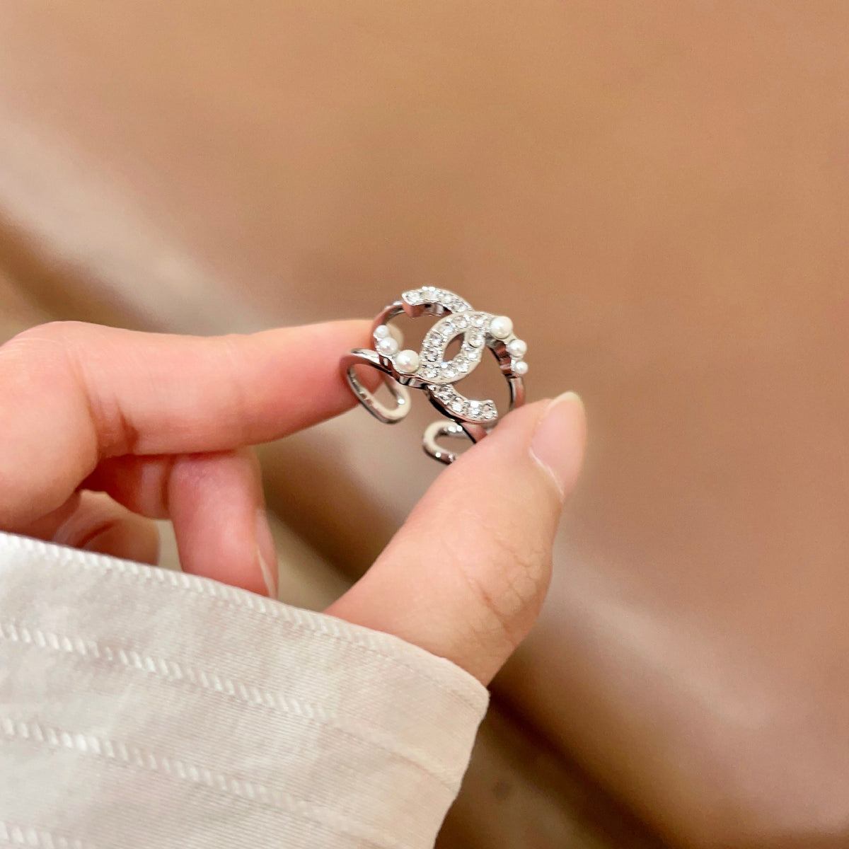 Double-C Emblem Statement Ring in Polished Metal-Tone – White Detail – Design 002 side detail