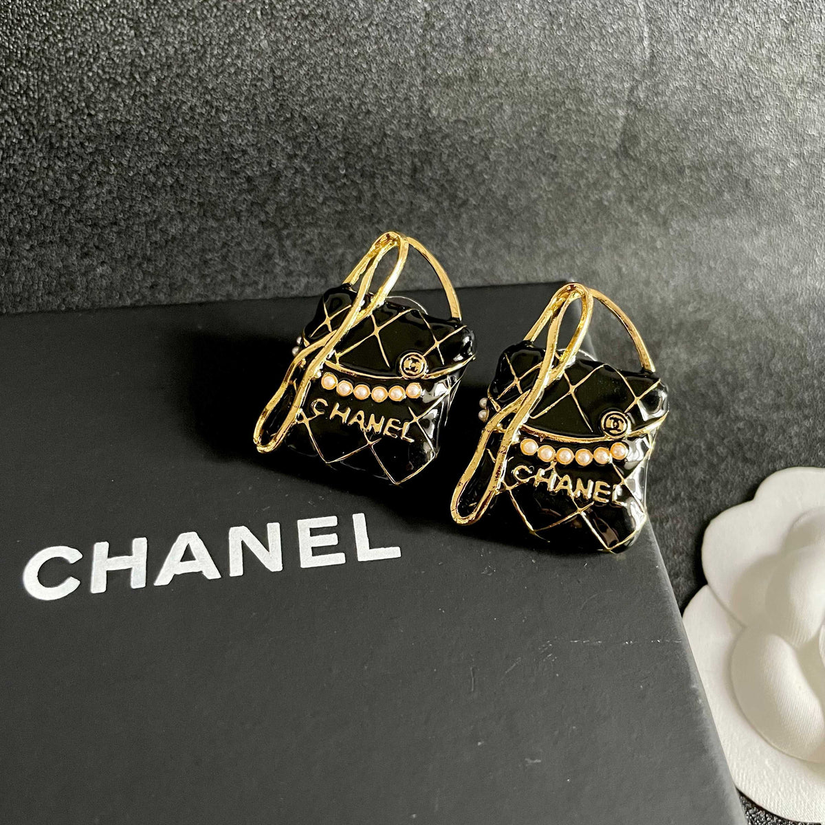 Double-C Emblem Stud Earrings in Polished Metal-Tone – Design 182 detail view
