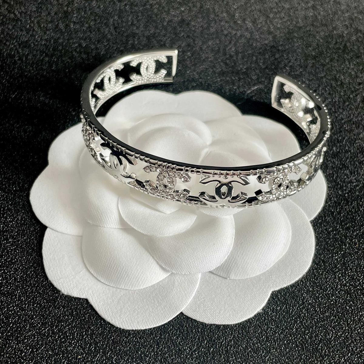 Letter Bangle in Polished Metal-Tone – Red Detail front product view