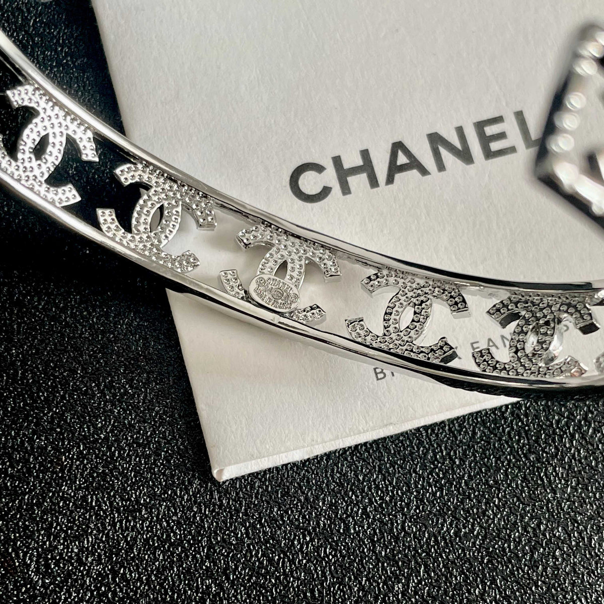 Letter Bangle in Polished Metal-Tone – Red Detail main product view