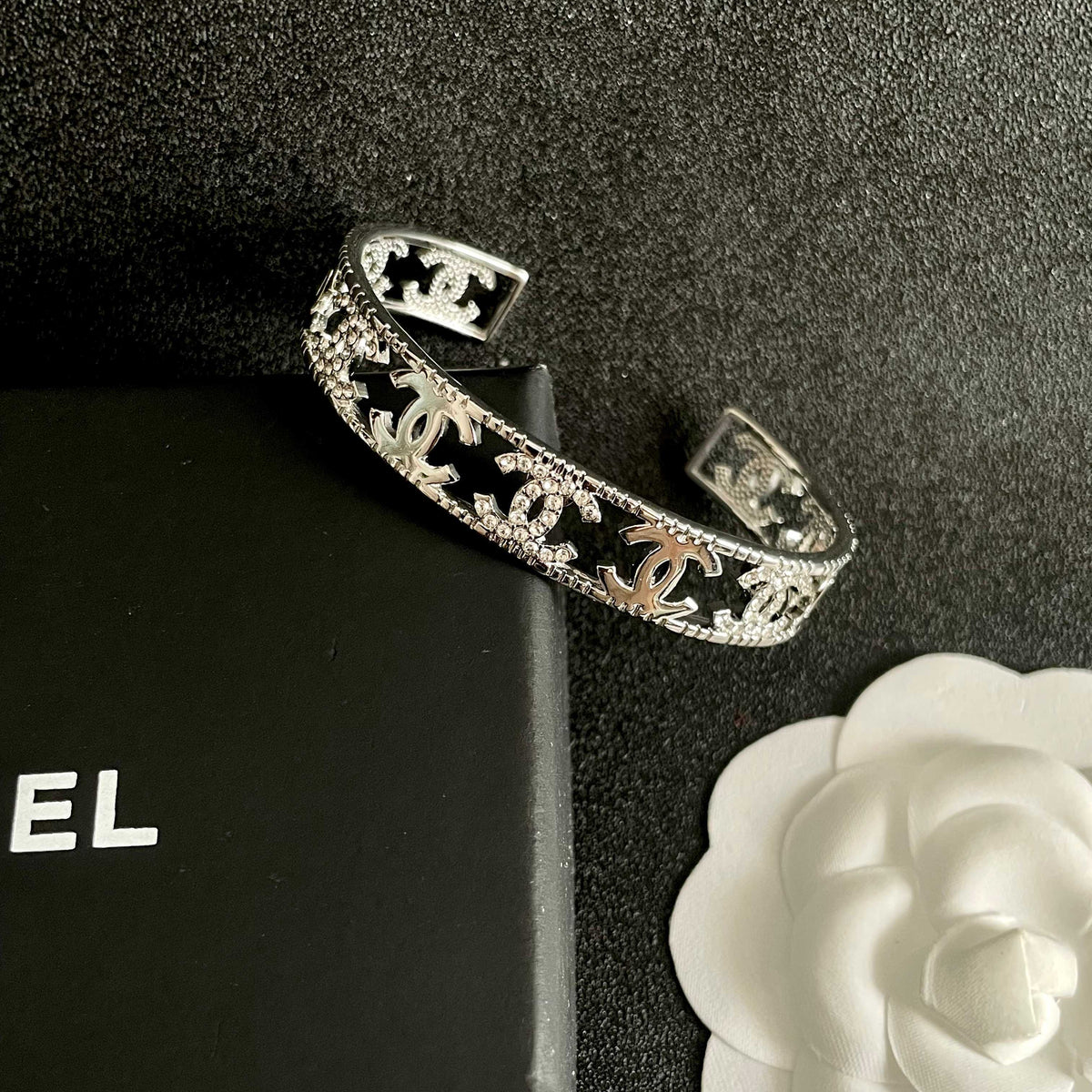 Letter Bangle in Polished Metal-Tone – Red Detail detail view