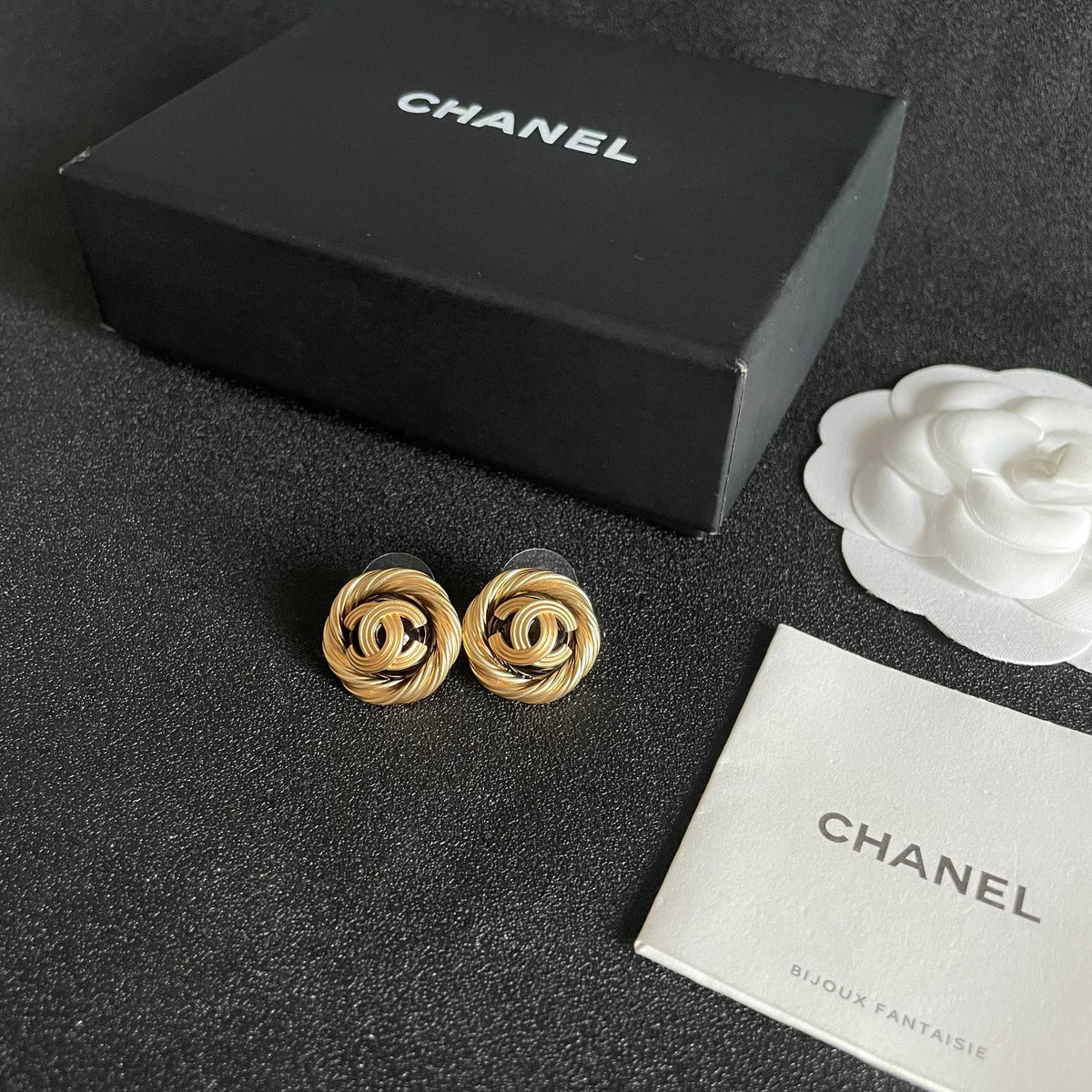 Double-C Emblem Stud Earrings in Polished Metal-Tone – Design 387 close-up detail