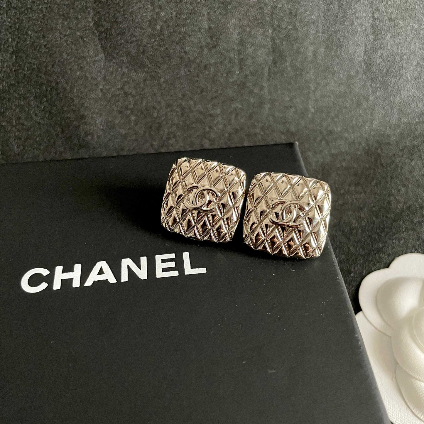 Double-C Emblem Stud Earrings in Polished Metal-Tone – Design 397 detail view