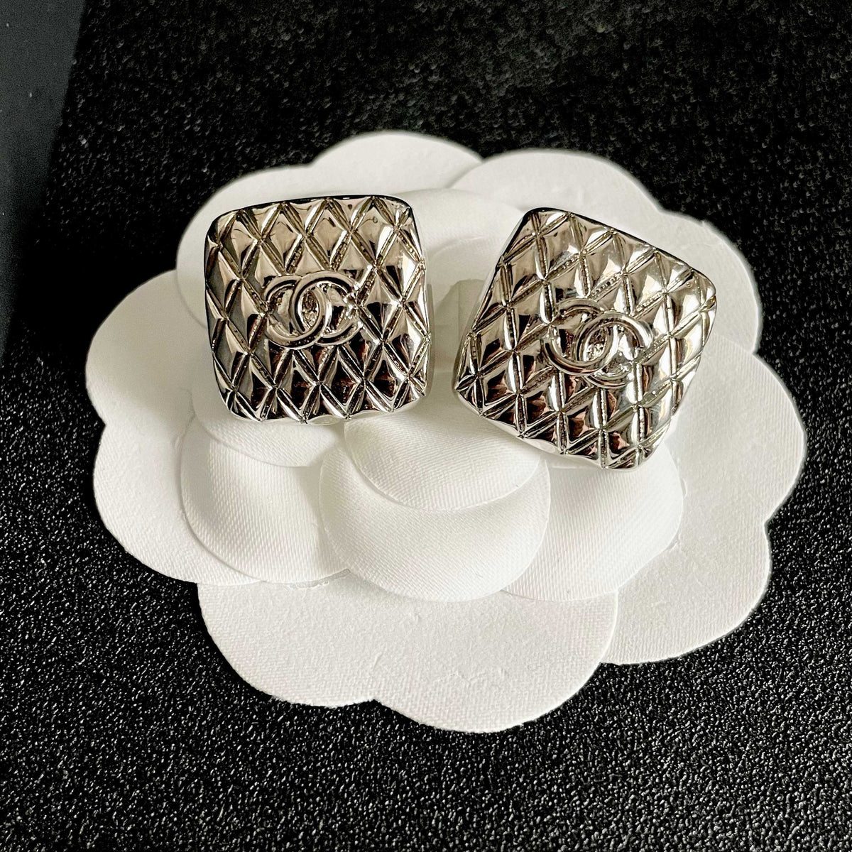 Double-C Emblem Stud Earrings in Polished Metal-Tone – Design 425 front product view