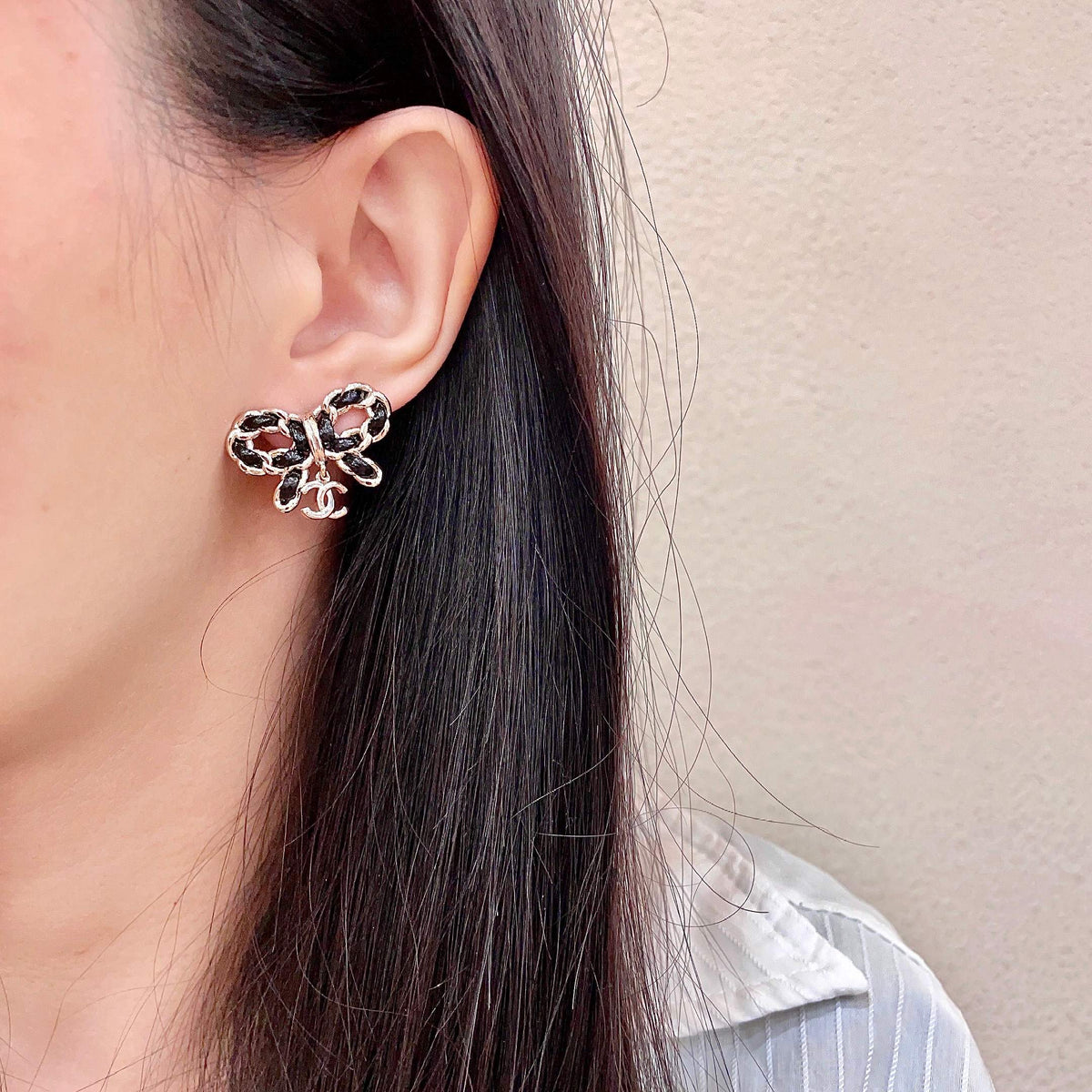 Signature Emblem Stud Earrings in Polished Metal-Tone – Design 119 detail view