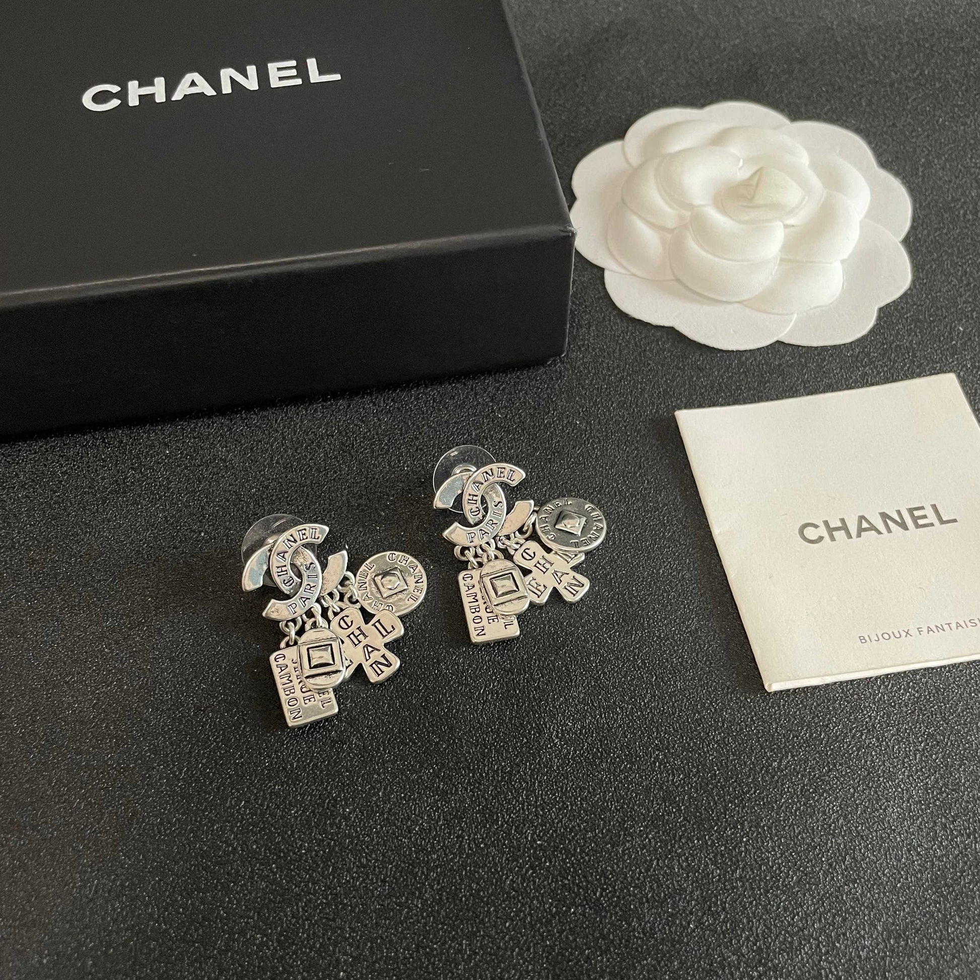 Double-C Emblem Stud Earrings in Polished Metal-Tone – Design 449 styled product view