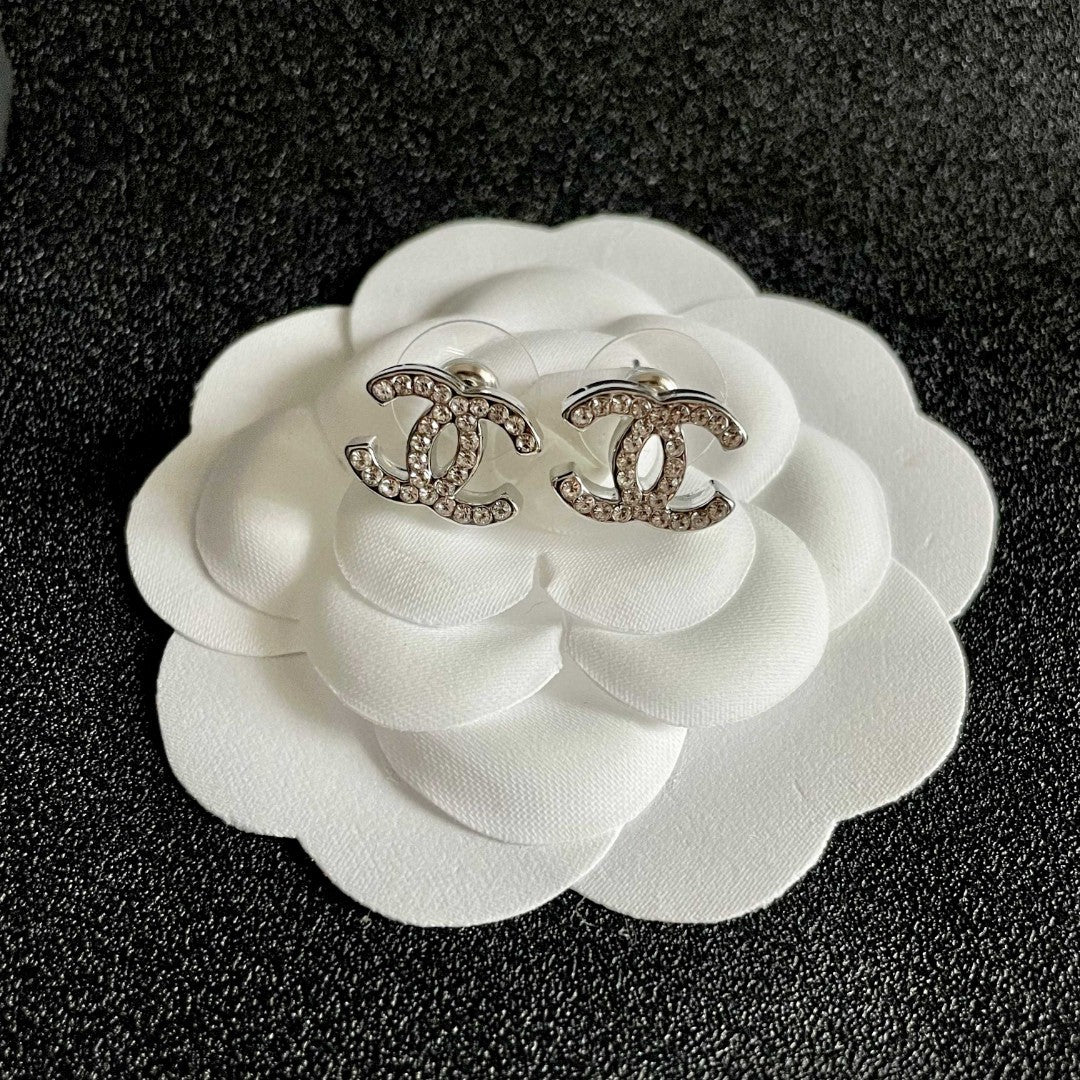 Double-C Emblem Stud Earrings in Polished Metal-Tone – Design 441 front product view
