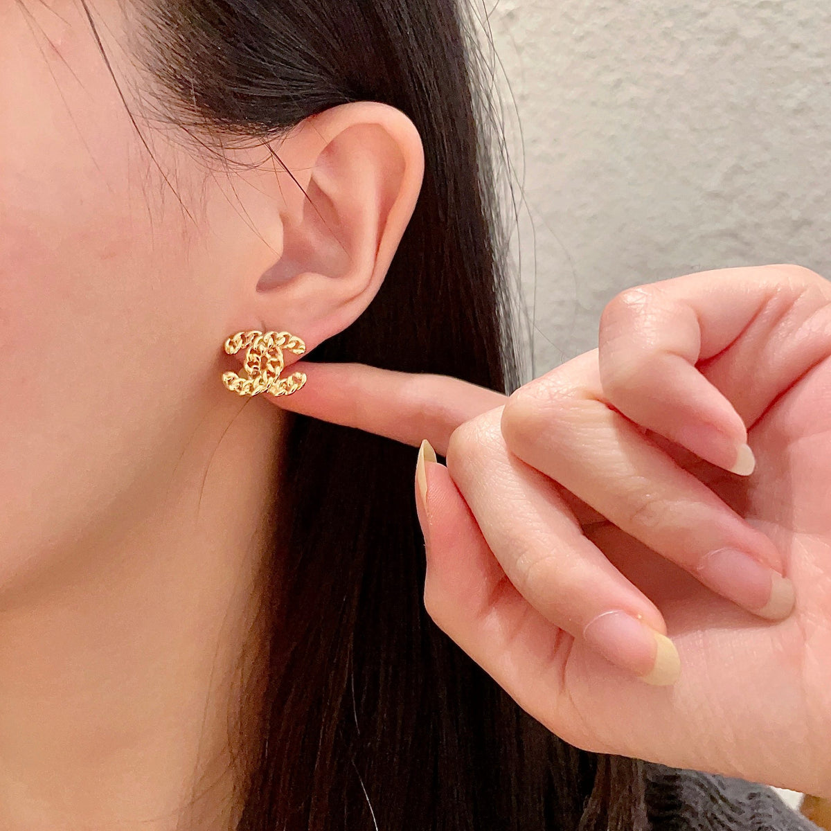 Double-C Emblem Stud Earrings in Polished Metal-Tone – Design 440 front product view