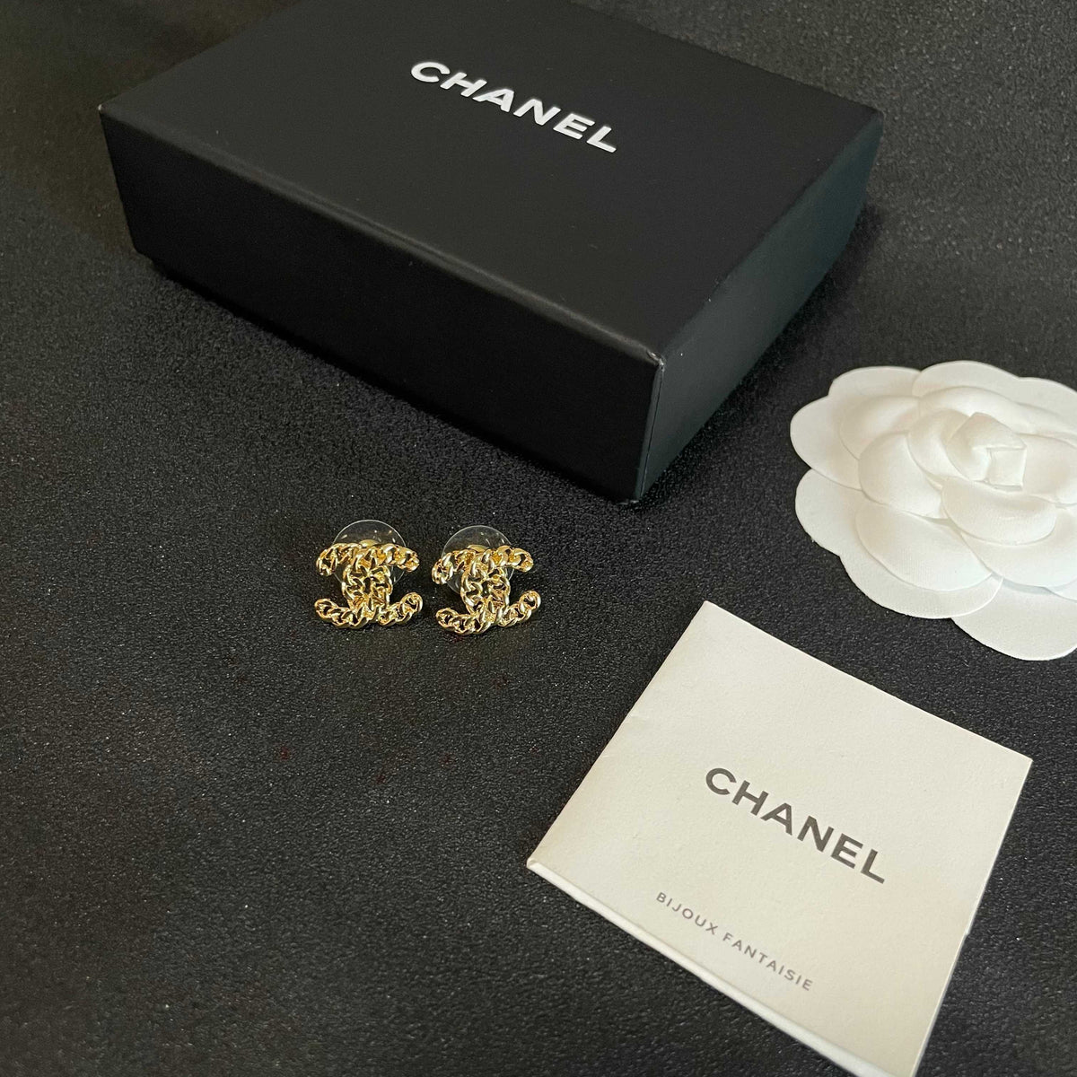 Double-C Emblem Stud Earrings in Polished Metal-Tone – Design 440 close-up detail