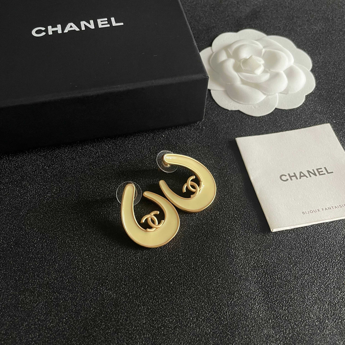 Double-C Emblem Stud Earrings in Polished Metal-Tone – Design 460 styled product view