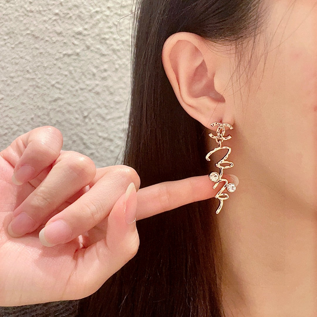 Double-C Emblem Statement Earrings in Polished Metal-Tone – Design 070 detail view