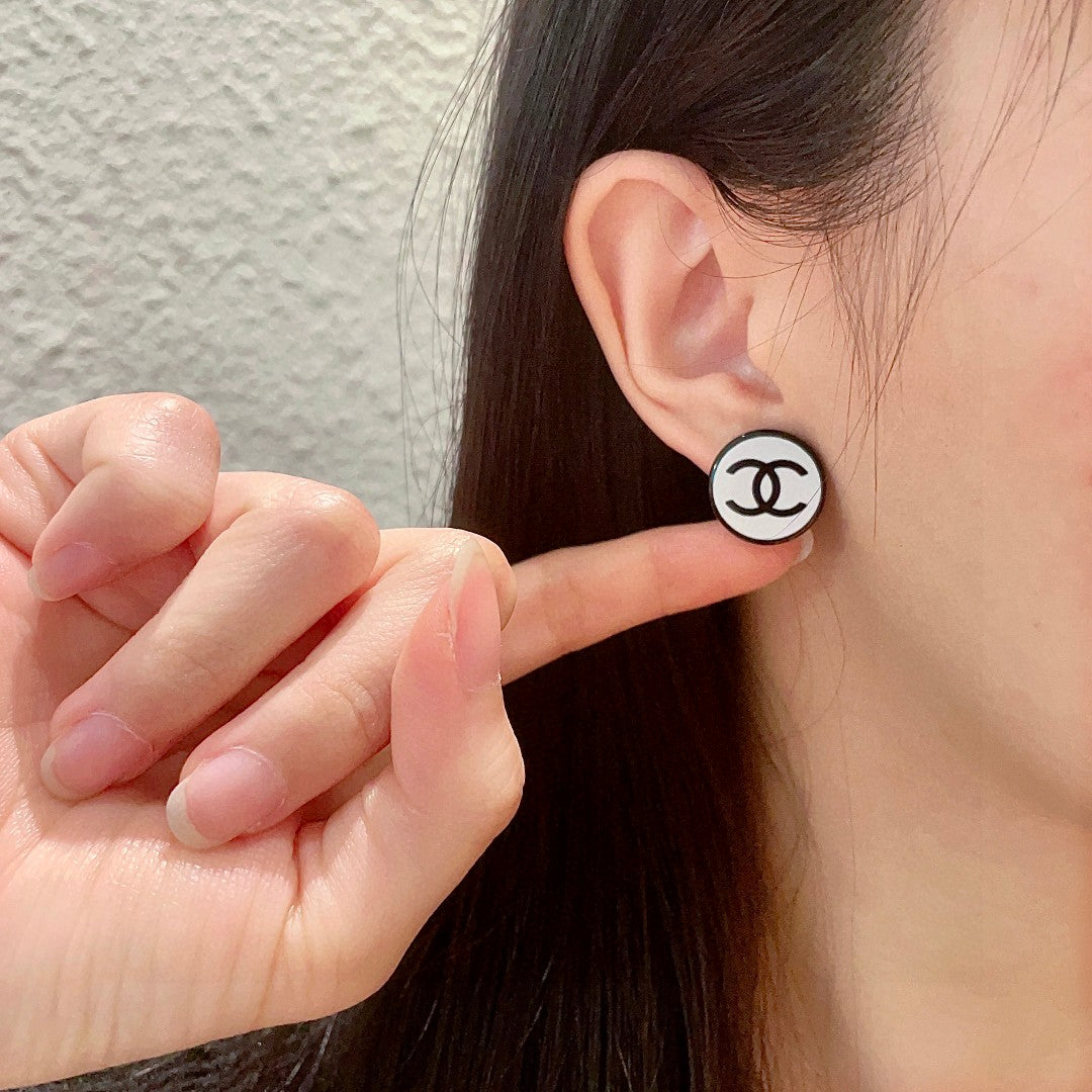 Double-C Emblem Stud Earrings in Polished Metal-Tone – Design 432 front product view