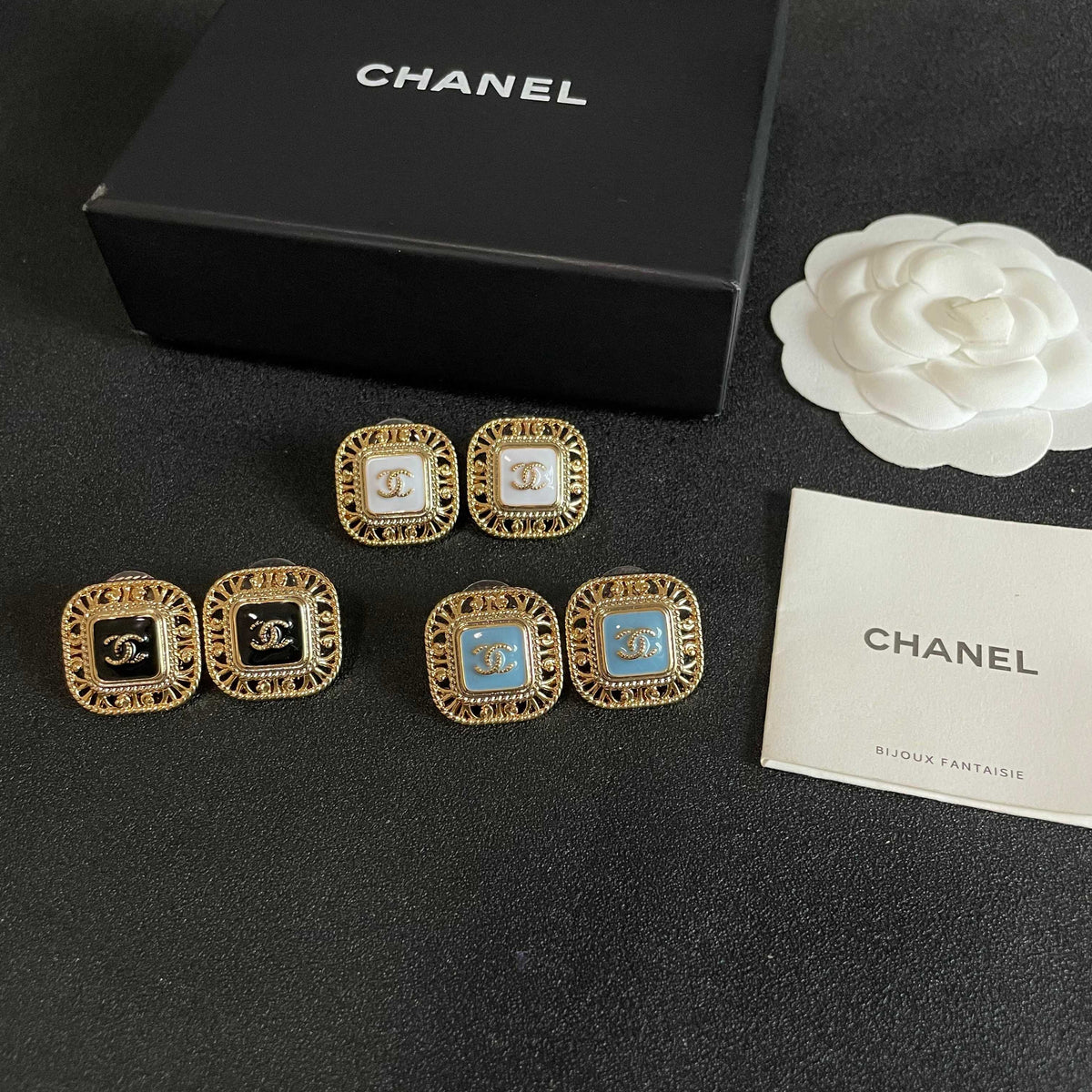 Double-C Emblem Stud Earrings in Polished Metal-Tone – Design 138 close-up detail