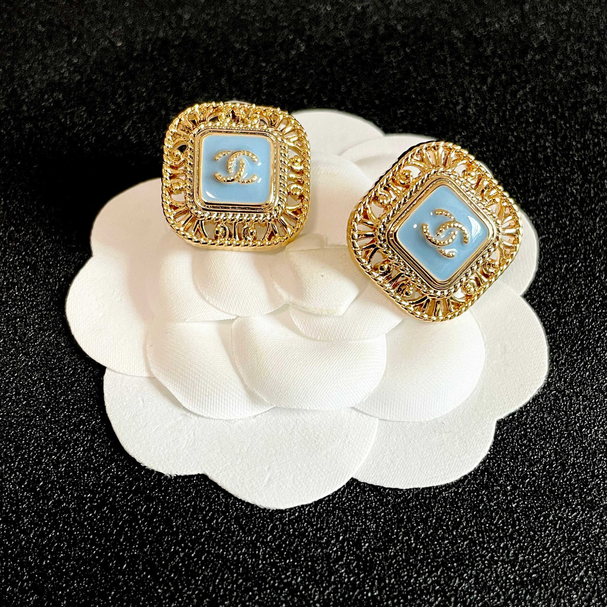 Double-C Emblem Stud Earrings in Polished Metal-Tone – Design 138 front product view
