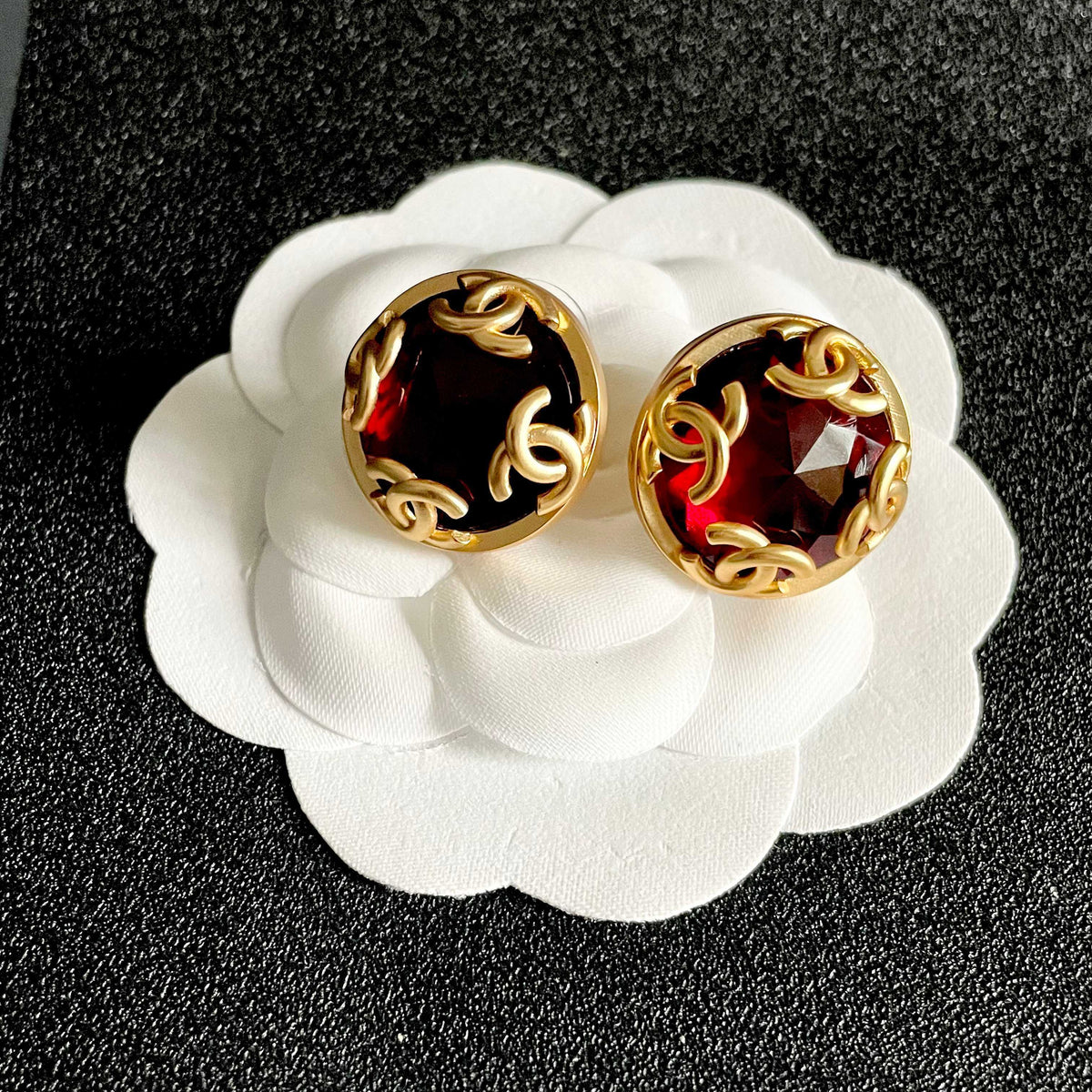 Double-C Emblem Stud Earrings in Polished Metal-Tone – Design 105 front product view