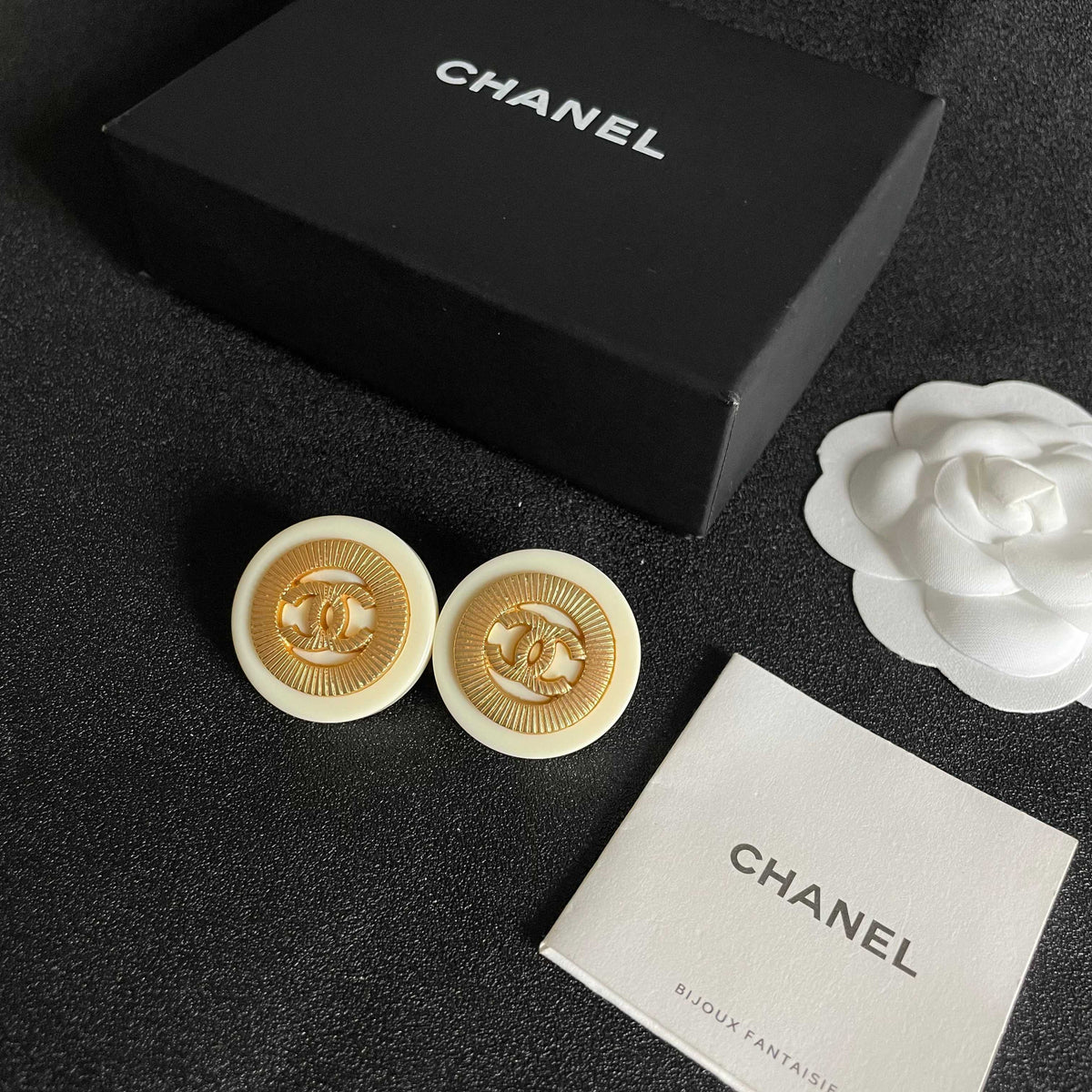 Double-C Emblem Stud Earrings in Polished Metal-Tone – Design 029 close-up detail