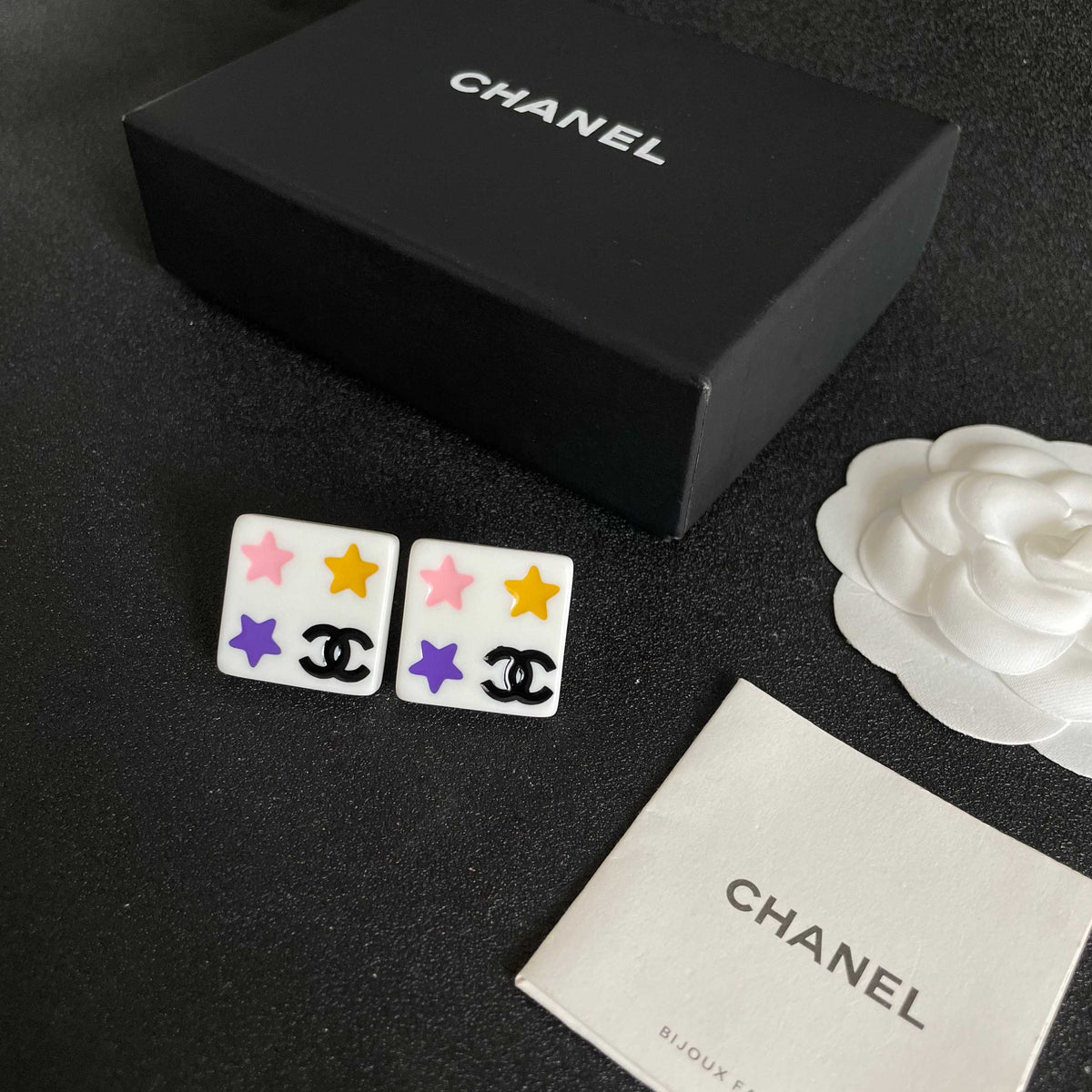 Double-C Emblem Stud Earrings in Polished Metal-Tone – Star Detail – Design 003 close-up detail