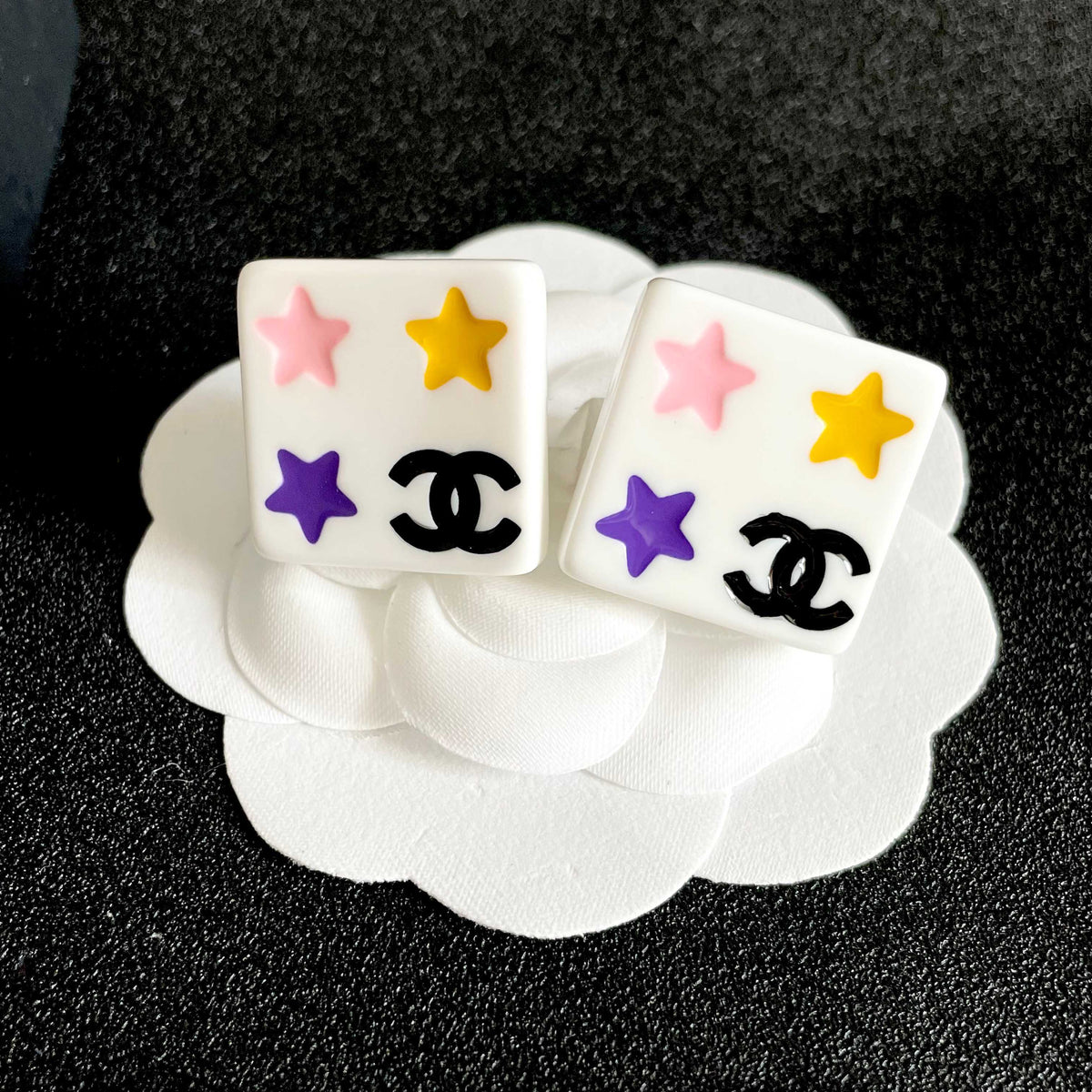 Double-C Emblem Stud Earrings in Polished Metal-Tone – Star Detail – Design 003 front product view