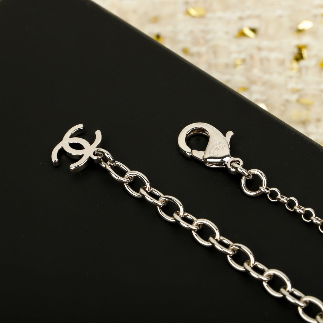 Double-C Emblem Pendant Necklace in Silver-Tone – White Detail close-up detail