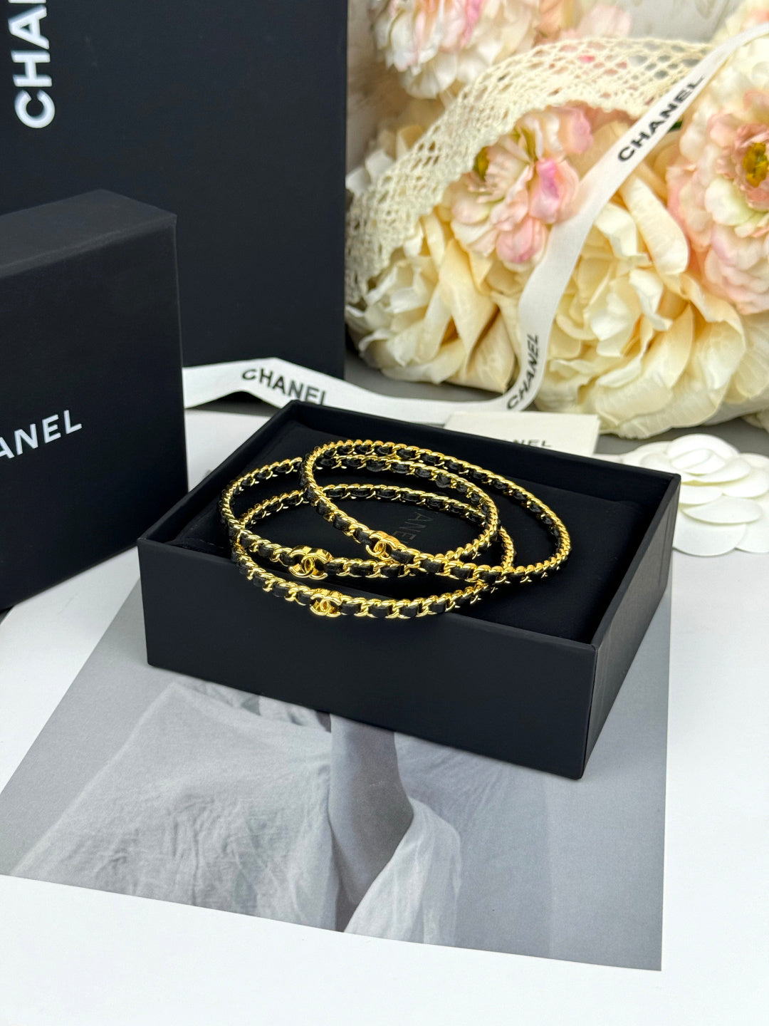Signature Emblem Bangle in Black-Tone front product view