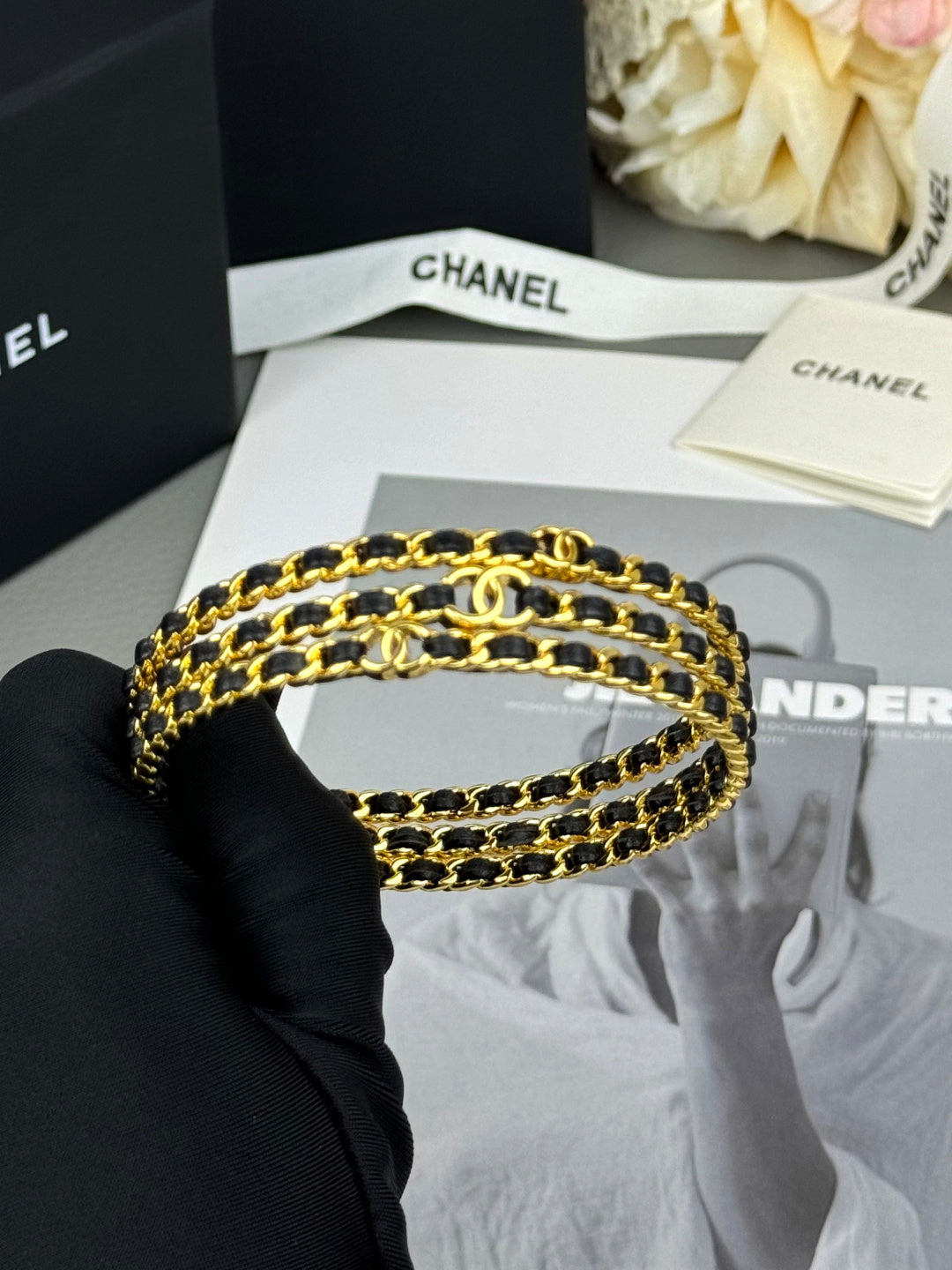 Signature Emblem Bangle in Black-Tone detail view