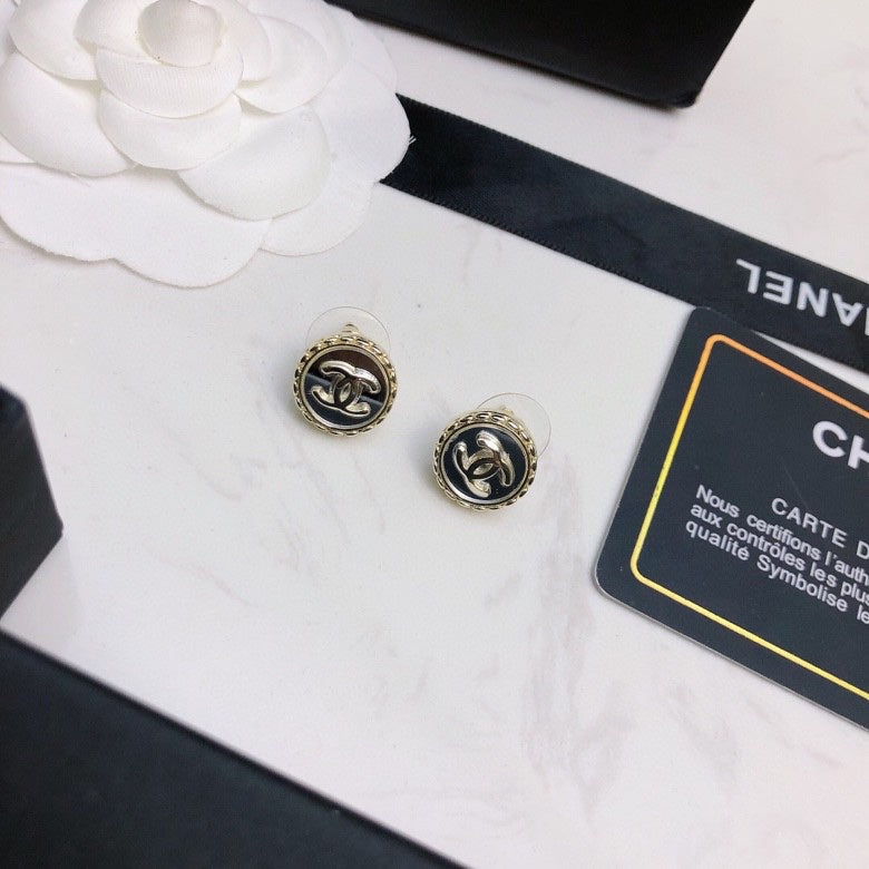 Signature Emblem Stud Earrings in Polished Metal-Tone – Red Detail – Design 002 close-up detail