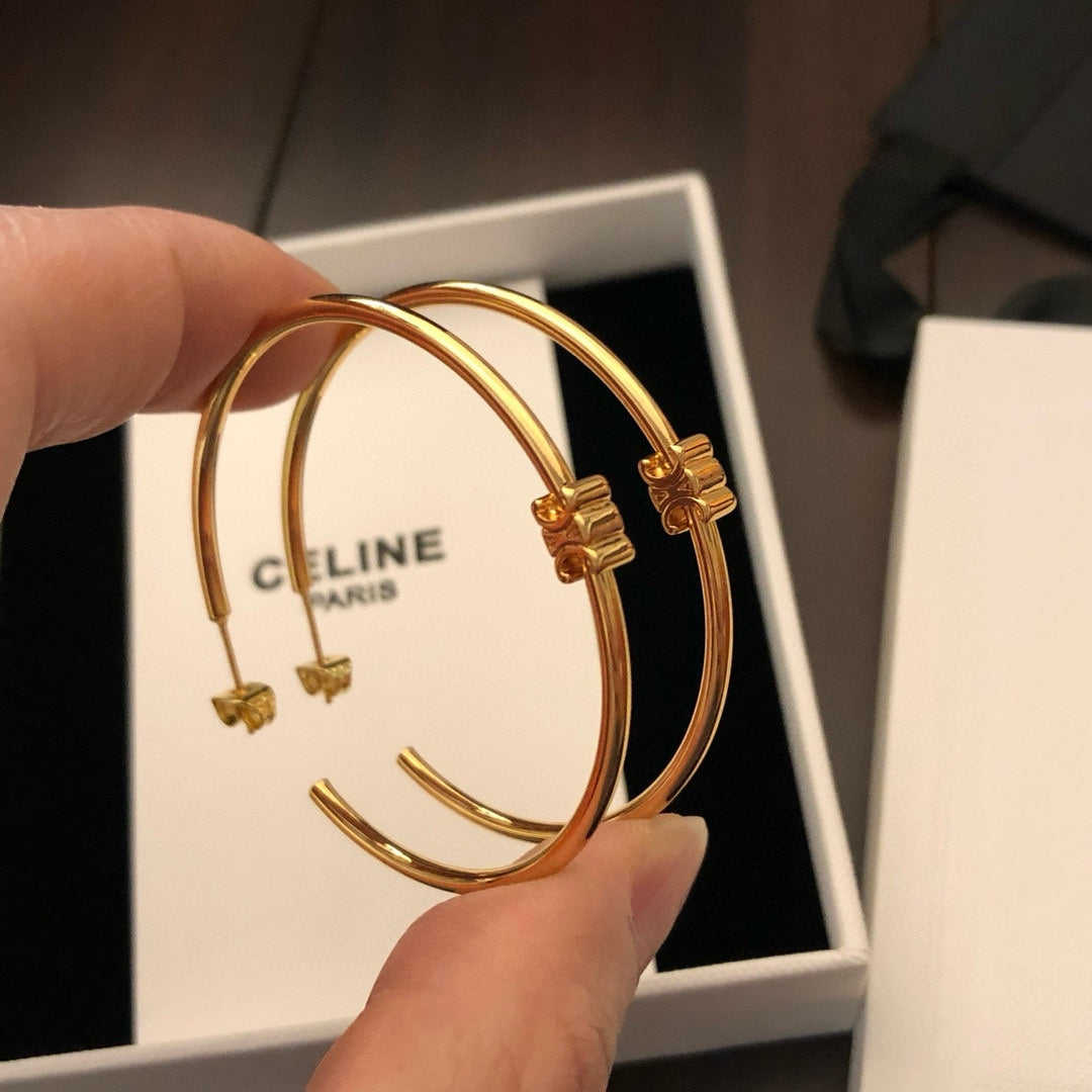 Oversized Triomphe-Inspired Emblem Statement Earrings side detail