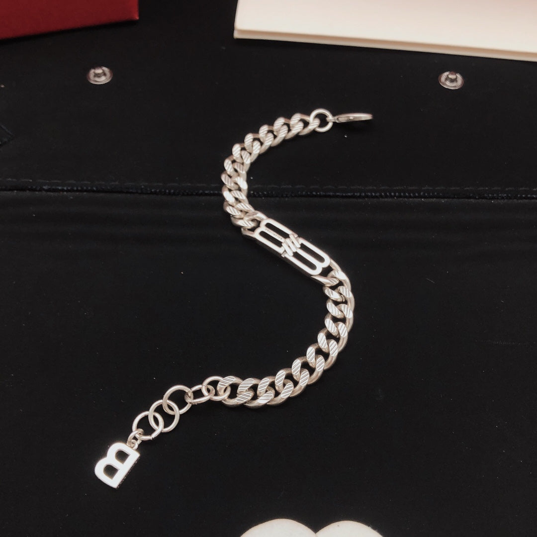 Geometric Emblem Bracelet in Gold-Tone close-up detail